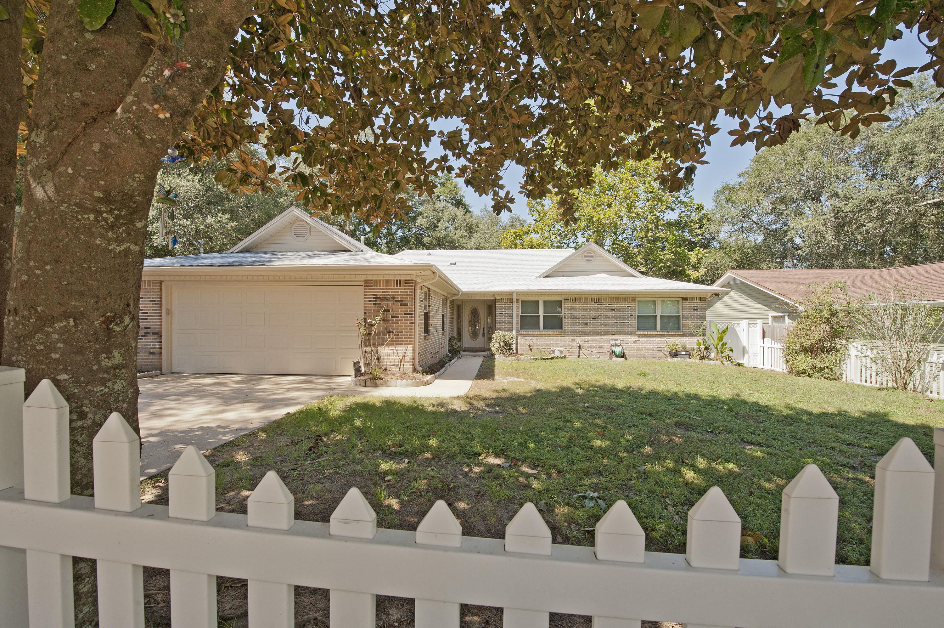 Long time pride of ownership is relevant in this meticulously maintained all brick home. New pex plumbing in spring of 2017, additional R-13 insulation added in winter of 2017, New roof in 2016, new circuit breaker panel in 2015, new hot water heater in 2008, new 2 ton a/c unit. The Generac whole house generator maintains a normal routine for everyone during the active hurricane season. Seller is leaving a full suite of Kenmore appliances and a one year home warranty. Seller has also just performed $2700 of fireplace and chimney maintenance - perfect timing for the cold weather that is setting in.