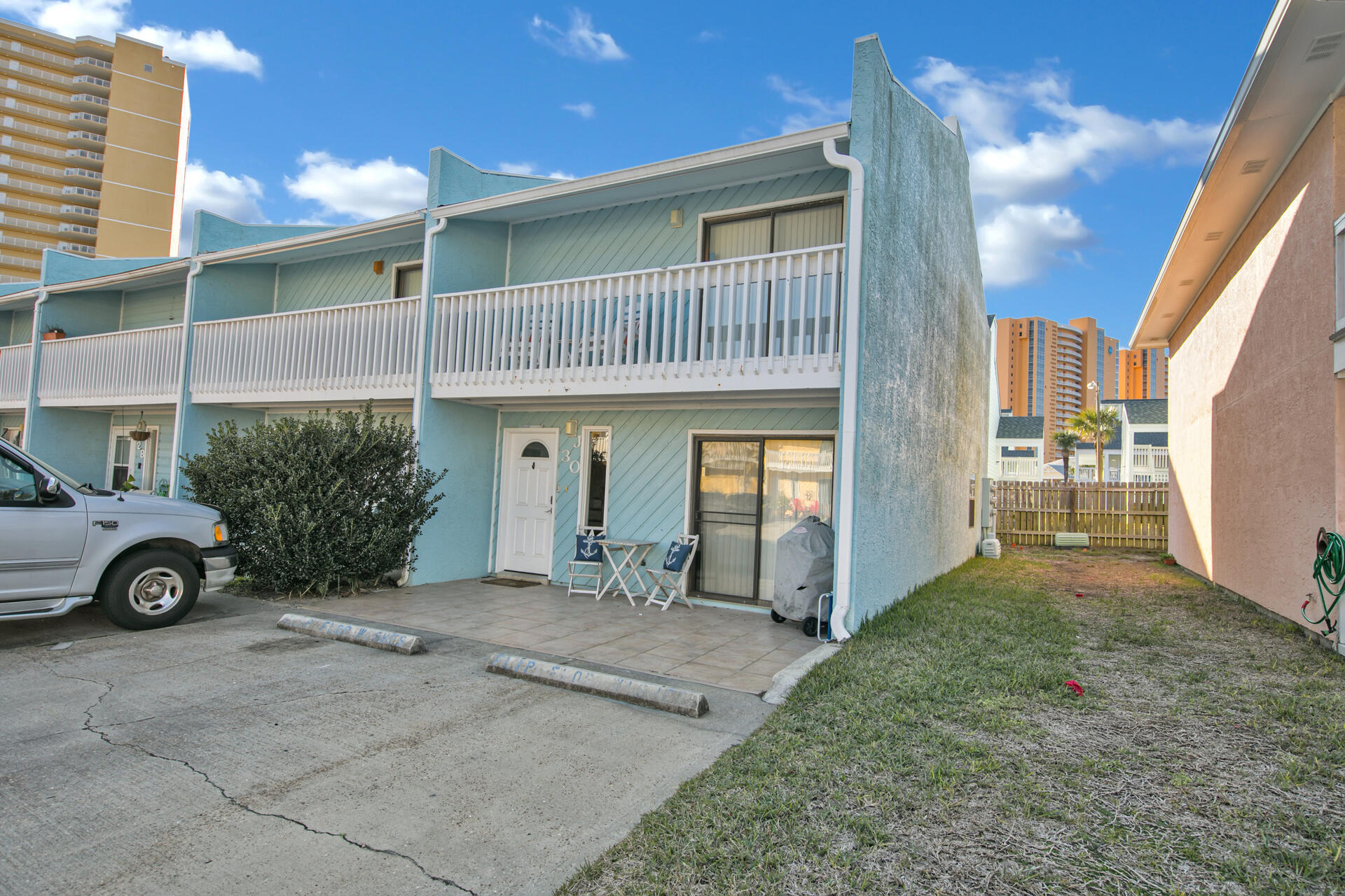 HOA is not mandatory but without it you will not get access to community amenities. Unit has two dedicated parking spaces. Home is tile
throughout the main living area, hardwood floors in stairs, hallway and bedrooms, interior/exterior doors, trim and molding, ceiling popcorn
removal, 3rd full bathroom added, and a NEST thermostat system that you can control from your phone. Washer/Dryer and furniture are negotiable to include with home. Public Beach access within walking distance.