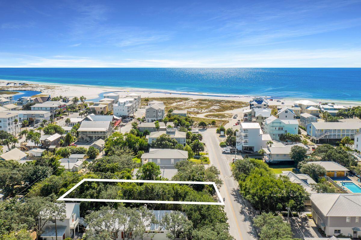 This property south of Scenic 30A is one of the last buildable lots available in historic Grayton Beach. The 50' x 140' parcel has owner drivable rear access from a pedestrian alley closed to auto through traffic that ends steps from the beach, popular Red Bar, other restaurants, and shopping. Less than two blocks from the Gulf of Mexico, the location affords a beach entrance that allows the use of permitted four wheel drive vehicles and trailered boat launching from the beach.
Covered with native magnolias, palmettos, and sand live oaks, this natural masterpiece is an unpainted canvas awaiting your plan for a beach dream home. The area was first settled by Major Charles Gray in 1885. Grayton Beach is a slower pace, "Old Florida Style", bicycle friendly community nestled among over 2,200 acres of Florida State Park land, the 100 acres of Western Lake popular with paddle boarders, white sugar sand beaches, and the Gulf. Water sports include kayaking, surfing, swimming, crabbing, and fishing. Sea turtle nests on the pristine beaches considered among the most beautiful in the United States overlook pastel sunsets melting into emerald green Gulf waters.

This unique home site that has not been available in the marketplace for eighty years could be your very own beach Paradise.