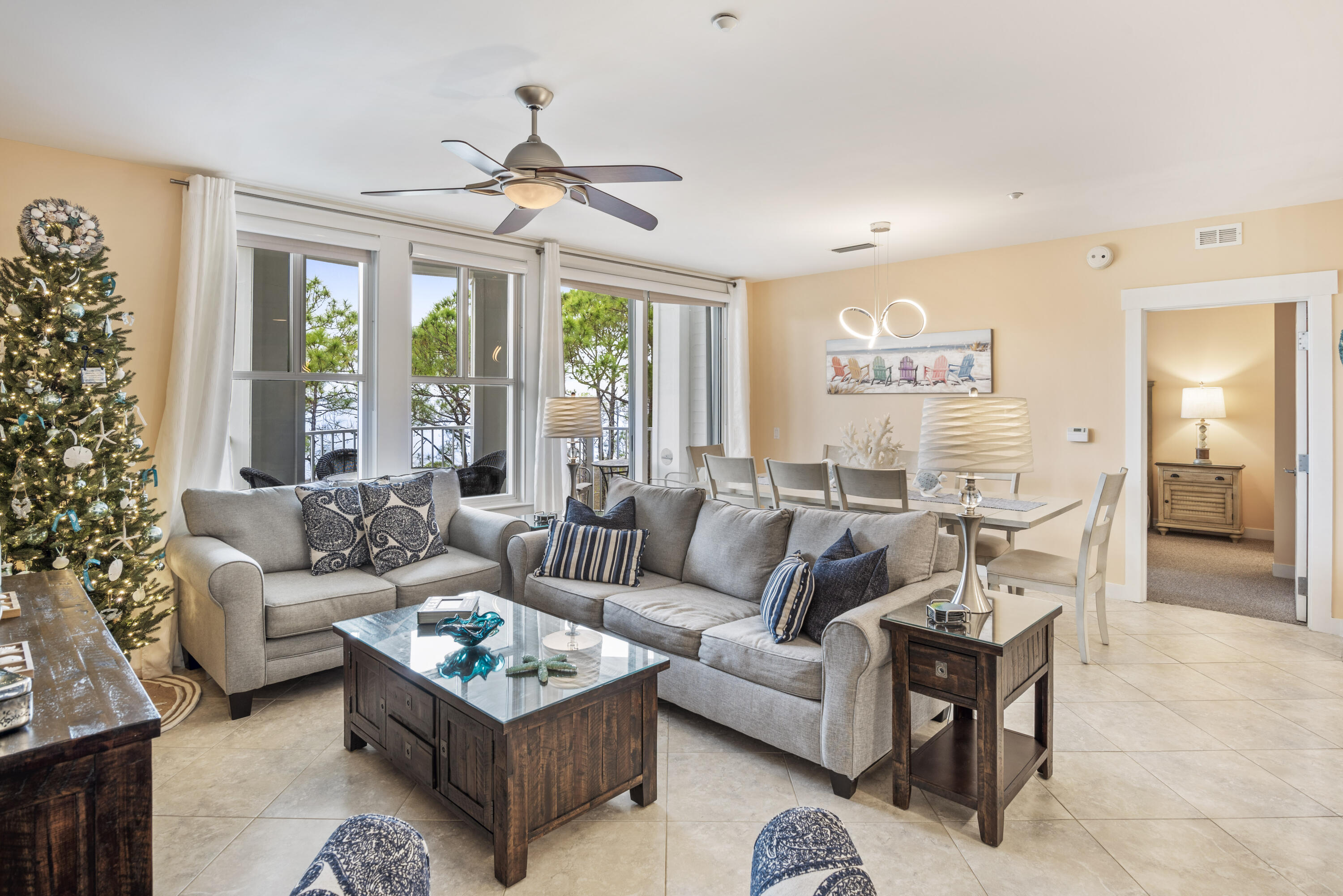 Newly updated and freshly decorated, this 2 bedroom 3 bathroom property offers incredible views of the Choctawhatchee Bay and delivers a sense of privacy from the oversized covered balcony. Rarely do these larger bay facing units come available. This unit has an attached studio which acts as a lockout affording the property to be used in its entirety as a 2 bedroom condo or used and rented separately as a 1 bedroom condo and a single studio unit. Upgrades include new appliances, plantation shutters, wood-look porcelain flooring, interior paint and new furnishings. Bahia is located in the heart of the Grand Complex within The Village of Baytowne Wharf, a year-round pedestrian village with shops, dining, playground, live music and more. Owners have access to the private Solstice Club on the bay, an amenity for owners and their guests, featuring outdoor barbecue area, kitchen, screened porch with gas fireplace, indoor bar, flat screen TV and comfortable seating inside and out. The Grand Sandestin community also offers a resort style pool, hot tub and fitness center. As an owner in Sandestin, you will enjoy access to miles of sandy white beaches, 4 championship golf courses, The Village of Baytowne Wharf, full service marina, tennis center, walking and bike trails, and a professionally staffed fitness center with spa.