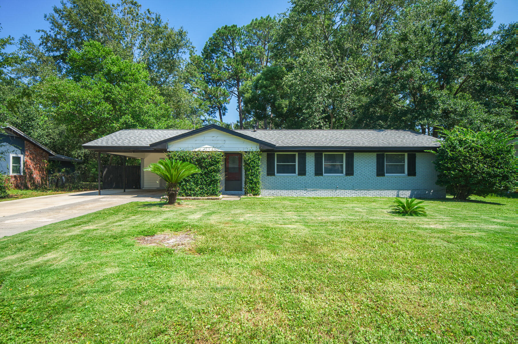 Location.....All brick updated home highlighting a spacious floor plan in the heart of Fort Walton Beach close to Fort Walton Beach High School.  This home features 5 bedrooms, 2 baths, 2 living areas, bar, separate laundry room and split bedroom plan.  Your large private  backyard oasis awaits you with a galvanized pool, firepit area,  pergola covered deck, fully fenced with 2 double gates & large open patio perfect for grilling.  Bar and built in media console convey.  Call to view today!  Buyer to verify all dimensions.
