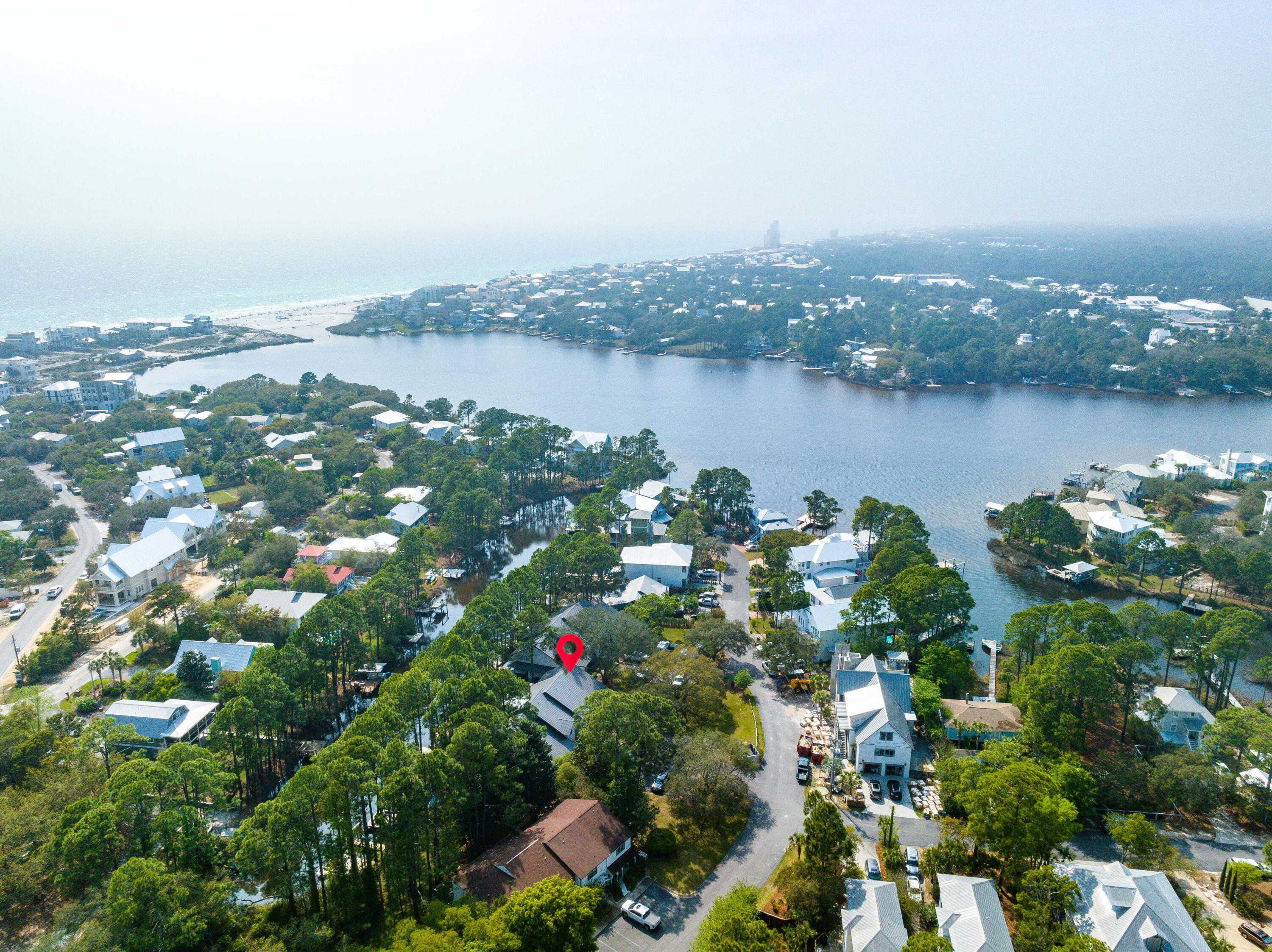 THIS IS IT! The one you have been waiting for! Fully remodeled interior with luxurious finishes, this property has it all! PRIVATE Dock on Eastern Lake where you can paddle or boat right over to the beach! Waterfront, South of 30A, and at this price, its the DREAM COME TRUE! 

Lakewood Townhomes recently underwent expansive exterior renovations as well including paint, doors, and a brand new metal roof! Seller has paid assessment in full! You get to enjoy the benefits! 

The kitchen features high end appliances including a 36' Commercial electric range/oven and VIEWS of Eastern Lake! The living room has a beautiful glass front gas fireplace and room to entertain! Master Suite encompasses the entire 2nd floor. Closet is giant and would make an excellent bunk room if buying as an investment.