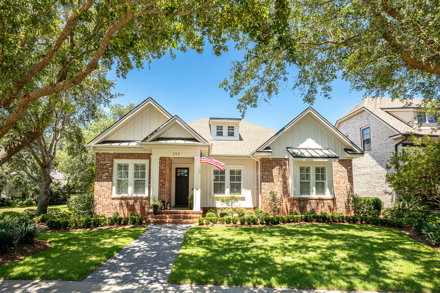 Tastefully updated and immaculately cared for Randy Wise home in Kelly Plantation. Featuring a neutral color palette, new fireplace surround and kitchen backsplash, and new landscaping, this home is move-in ready. The quality construction is built to last with brick and Hardiplank siding, 10' ceilings, central vacuum, walk-in attic and foam insulation. Oversized storage spaces and built-ins throughout! The spacious kitchen features a walk-in pantry, gas cooktop and a large island. Two luxurious master bedroom suites are sure to please owners and guests alike. The second-floor master may also double as a bonus room for entertaining. Enjoy a glass of lemonade on the screened-in sun porch or paved courtyard area. A nice easement on the side of the house offers extra space and privacy. Beautiful trees in the front provide a picturesque view and shade. This home is a short walk to the Kelly Plantation amenities which include a community pool, tennis, clubhouse, golf, playground, and pickle ball courts. Enjoy living is this beautiful gated community close to Destin's restaurants, shopping and beautiful beaches!
