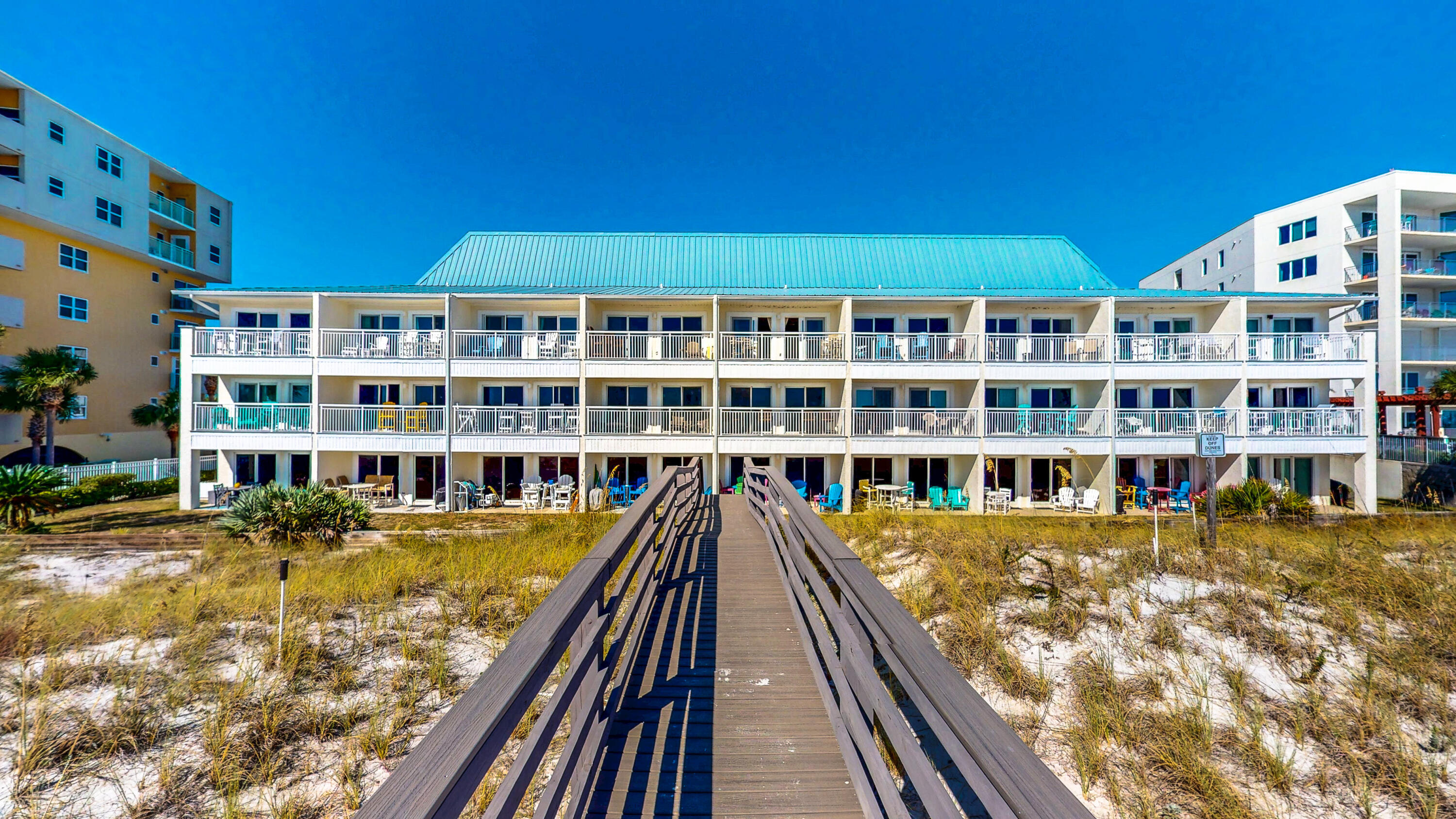 Welcome to Unit 108, a beautifully refreshed ground-floor condo offering relaxed coastal living with convenient beach access. Thoughtfully updated within the past two years — including new appliances and the removal of popcorn ceilings — this inviting space blends comfort, style, and low-maintenance design, perfect for full-time living, a vacation getaway, or an investment opportunity.

Inside, you'll find new vinyl plank flooring, fresh interior paint, and newer appliances that enhance the clean, open layout. The plumbing and HVAC system have also been updated, providing added value and efficiency. Enjoy the benefits of ground-level living, where you can grill outdoors and access the walkway leading over the dunes to the white sandy beaches of Okaloosa Island.

The complex has been recently revitalized with new exterior paint, windows, walkways, and an updated pool area, creating an attractive and well-maintained coastal community. This income-producing property allows for short-term rentals, giving you flexibility whether you're seeking a personal retreat, an investment, or both.

With an assigned parking space and a prime island location, Unit 108 delivers the best of coastal convenience and modern comfort.