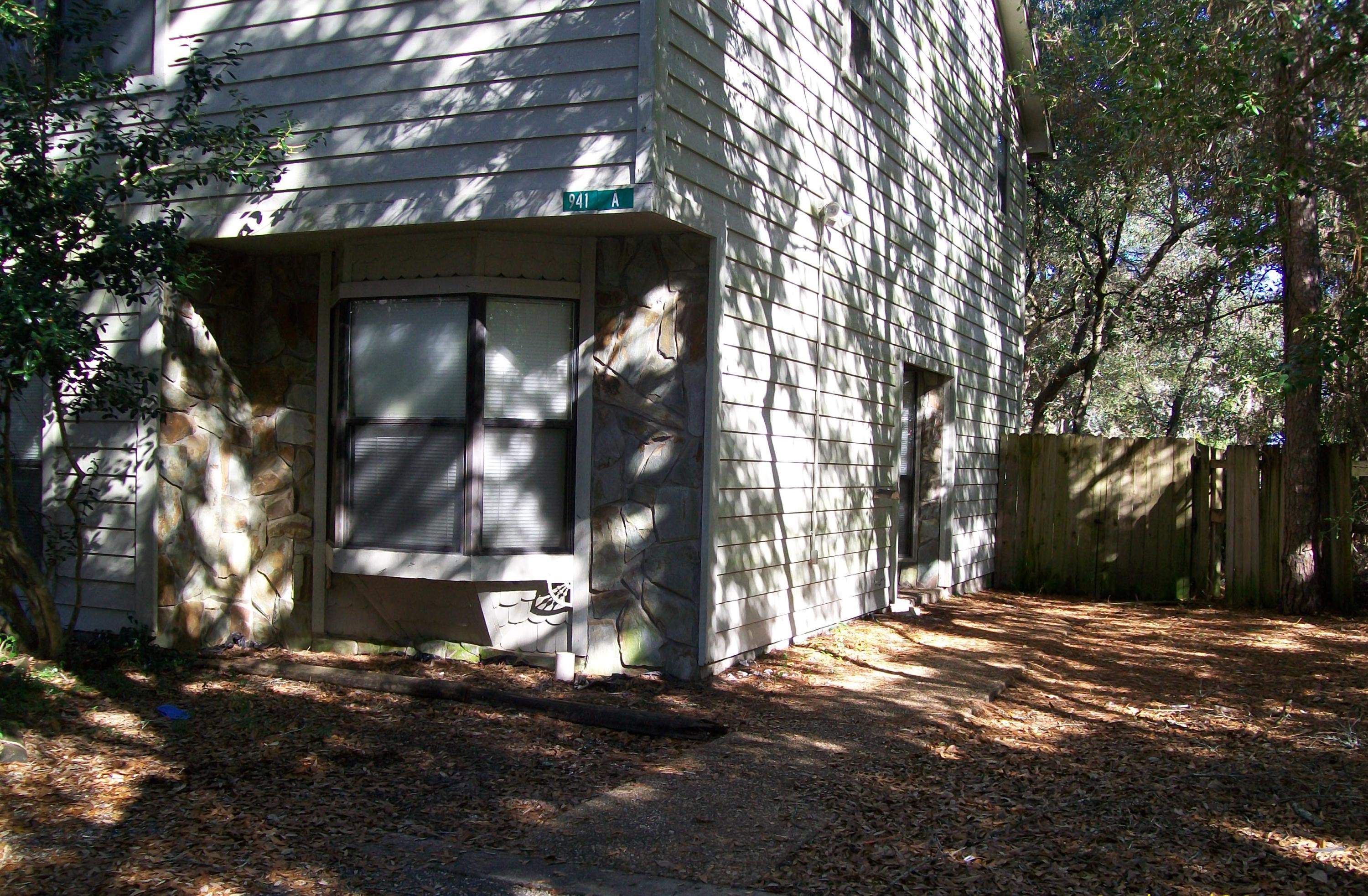 Spacious end unit townhome off Racetrack Rd. Located centrally between both Eglin & Hurlburt. Living room has a wood burning fireplace, dining and kitchen are combined. All bedrooms located upstairs. Back yard is fenced.