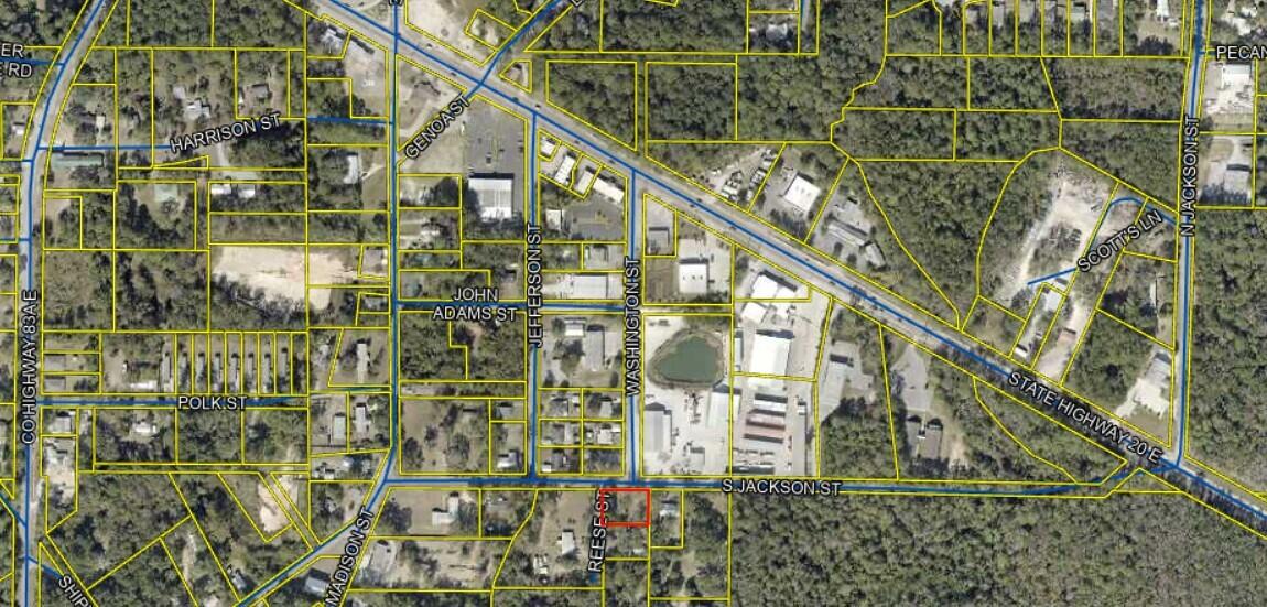 Zoned Residential/Commercial (RC), this vacant and level lot at 287 S. Jackson Street allows for a broad range of by-right residential and commercial uses, offering flexibility that is increasingly rare in the Freeport market. Under RC zoning, the property may be developed for residential use including single-family, duplex, or triplex construction, as well as commercial or professional uses such as office, retail, service, or mixed-use development, subject to City of Freeport standards. The RC district is designed to support neighborhood-scale commercial activity while maintaining compatibility with surrounding residential uses. This zoning permits multi-story construction and higher floor area ratios than traditional residential districts, making it well suited for income- producing projects or owner-occupied development. There is no minimum lot size requirement, allowing the site's dimensions to be efficiently utilized.

The seller currently has City pre-approval for a 3,600 square foot commercial building/warehouse, with civil plans, survey, and a building quote already in place, and civil approvals completed, providing a streamlined path to construction and reducing entitlement risk for a future buyer.

Located just off Highway 20, between Business Highway 331 and Bypass Highway 331, the property offers a 900-foot line-of-sight view down Washington Street from Highway 20, delivering strong visibility and accessibility. The site provides quick access to Interstate 10, Highway 98, Santa Rosa Beach, and the 30A corridor, positioning it within one of Walton County's fastest-growing growth corridors.

This is a rare opportunity to develop residential units, commercial space, or a mixed-use project on a cleared, development-ready site in the heart of Freeport. Additional information and documentation are available upon request.
