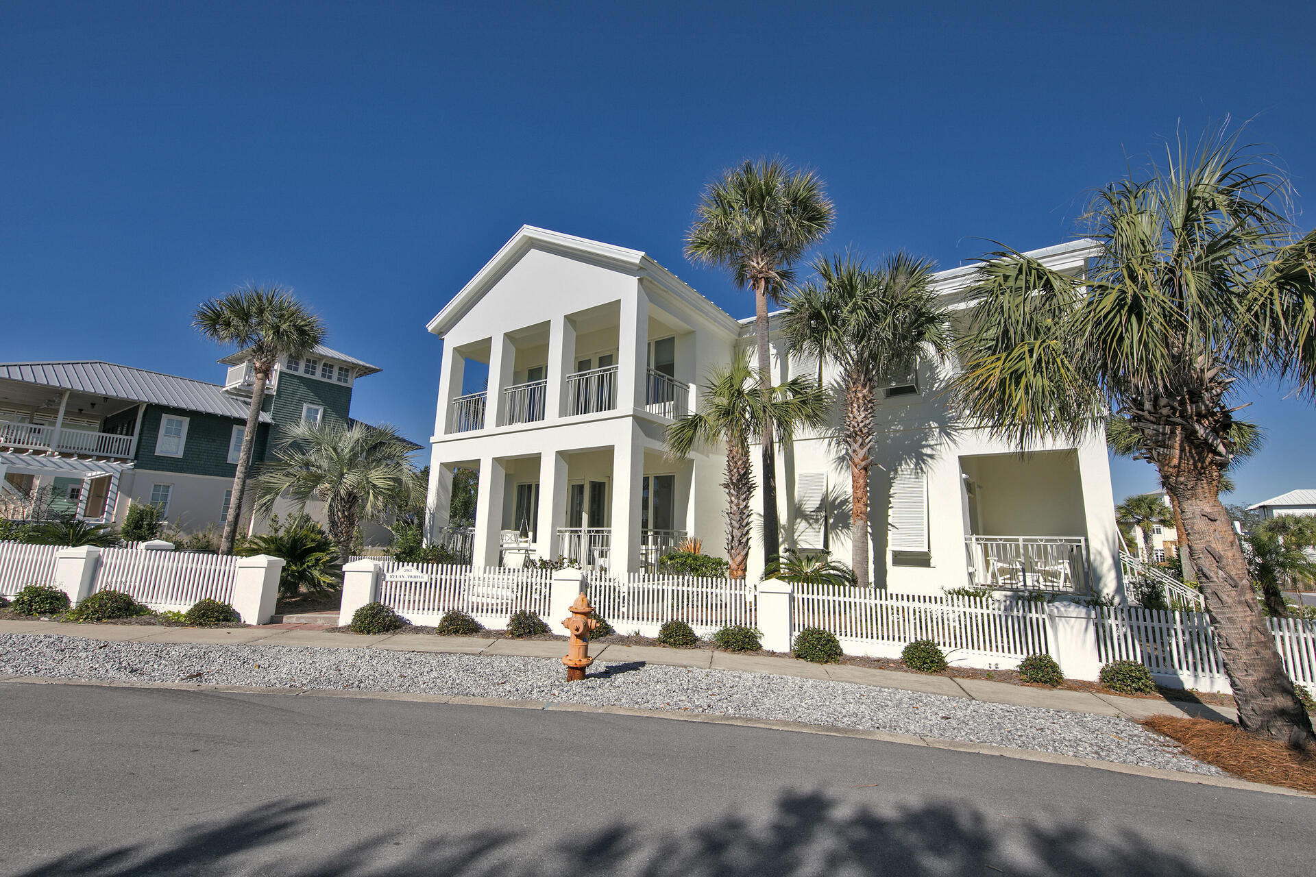 Main house and guest are just steps to the beach access across the street. The home features a main house with separate guest house Great Gulf Views from several locations. 
The main house is built of poured concrete., and finished in Stucco.. The floors are all tile for easy living. A separate guest house offers two bedrooms and a wide open living area. A golf cart garage completes this outstanding offering with great rental potential.