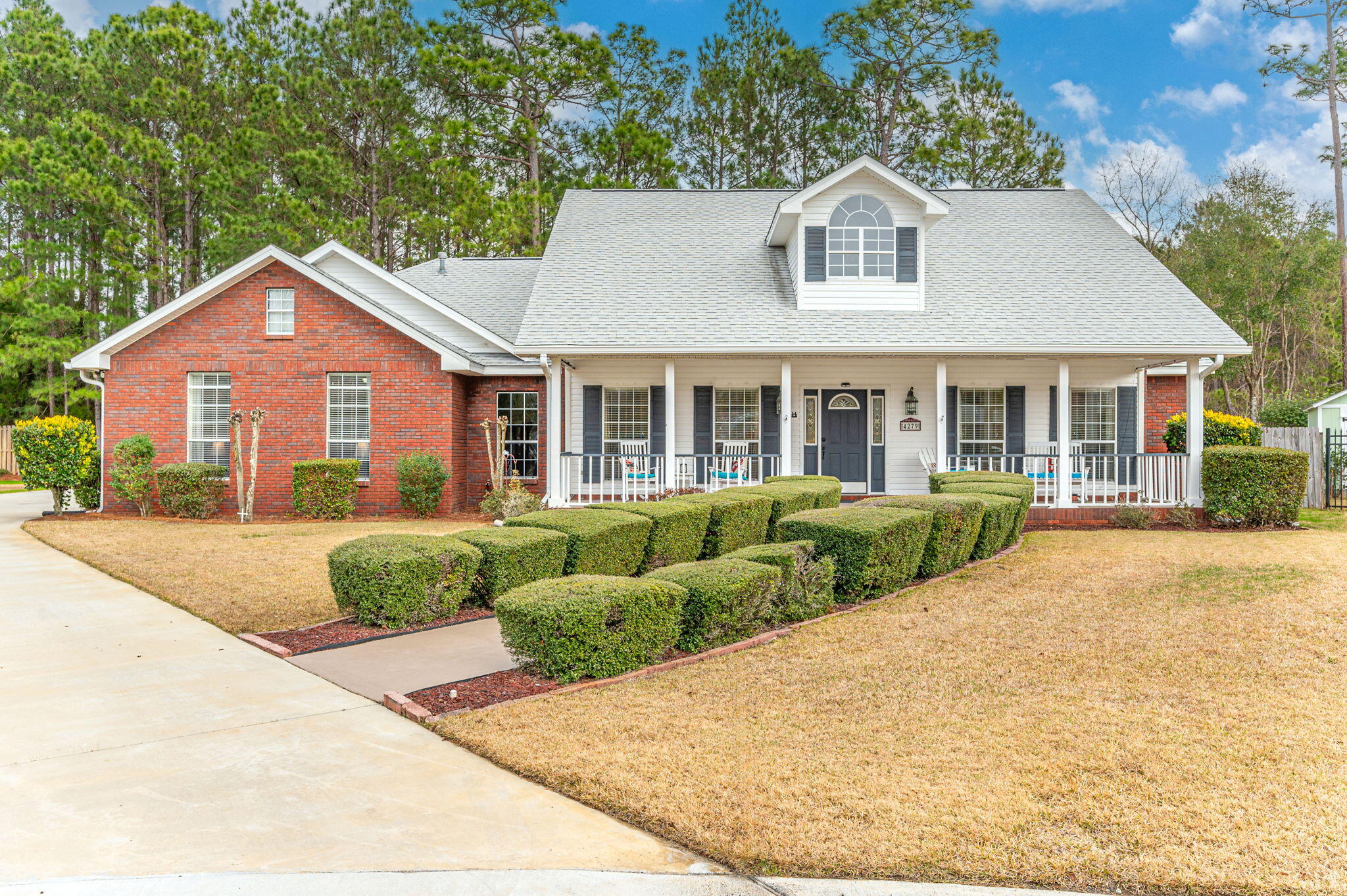 Situated at the back of a low-traffic cul de sac, find this charming, traditional 4-bedroom home. Relax on the wide, covered front porch and welcome guests or catch up with neighbors. Once inside, discover a thoughtful and highly flexible floor plan with multiple living and dining spaces, and a split bedroom layout. The foyer leads to the heart of the home - a cozy family room with gas fireplace that opens to the eat-in kitchen and dining nook. The kitchen sports custom 42'' cabinets, granite counters, and stainless steel appliances. To the right of the family room, find 3 additional bedrooms and a full bathroom. Continue to the opposite side of the kitchen/family room to access the primary suite, garage, guest half bath, dedicated laundry room, and the 20'x14' living room! The primary suite features two massive walk-in closets as well as an en suite bathroom with whirlpool tub, shower, two separate vanities, and linen closet. The fully fenced backyard is enhanced by mature landscaping, an open brick paver patio, as well as a covered patio, allowing year-round enjoyment of the outdoor space. An addition to the driveway in 2021 provides abundant space for parking and storage of recreational vehicles and boats, or the ideal spot for a basketball goal! Other recent improvements include the roof in 2017, HVAC and well for irrigation in 2020, water heater in 2022, and refrigerator in 2024. 
Zoned for top rated Niceville schools, offering an easy commute to Eglin, Duke, 7th Group, EOD School House, and a short drive to the white sand beaches, shopping, and dining available in Destin. Make your appointment to view this lovingly maintained home today!