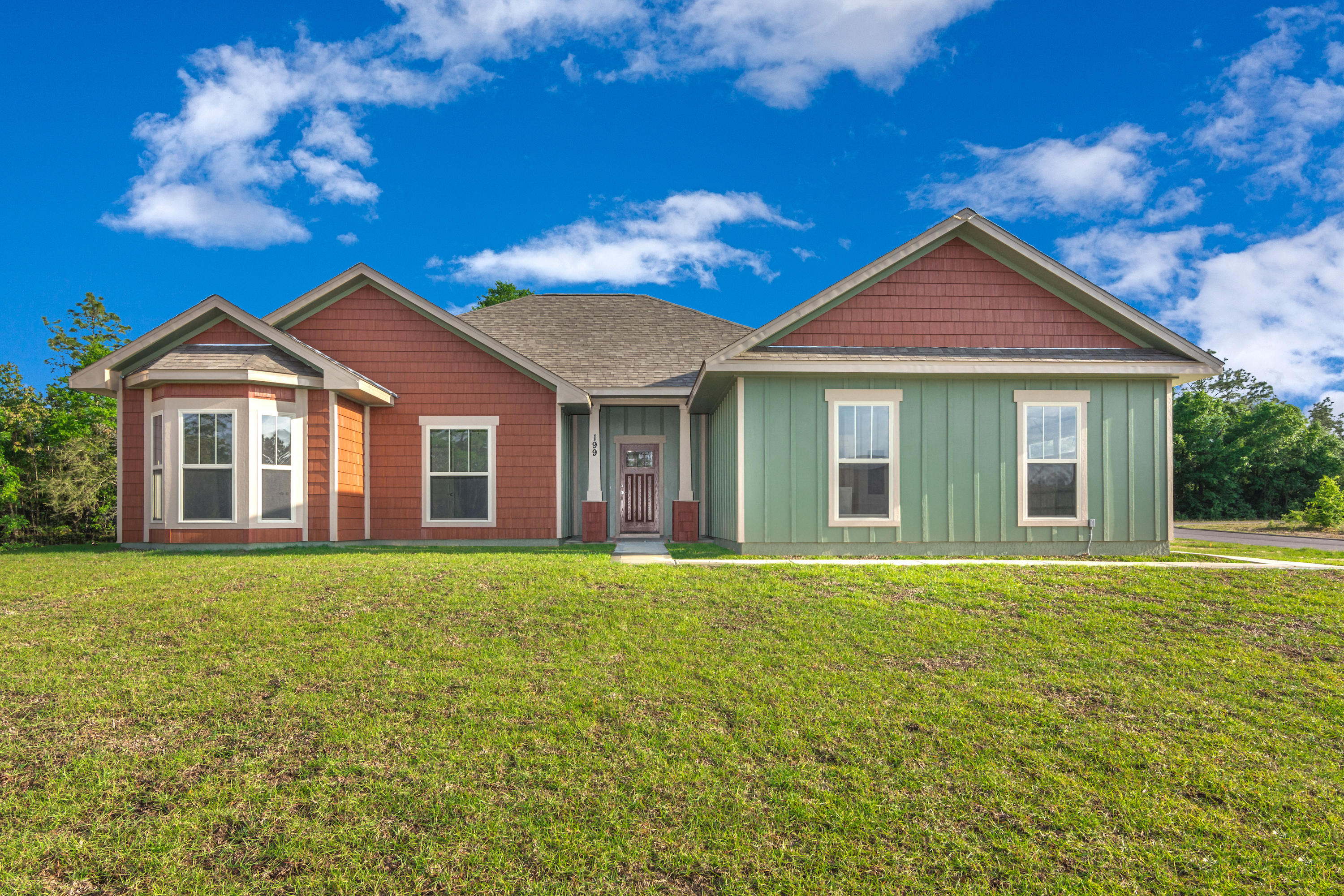 Come home to Valley View South! This new development has large home sites. The development is centrally located near shopping, schools, and restaurants. This huge home site is nearly -3/4 acre and a level corner lot for easy access. The custom built home is designed with an open living floor plan with laminate wood floors throughout. The kitchen and dining have impeccable cabinets with granite counter tops. Local Craftsmen, Local quality! New Development, New home!