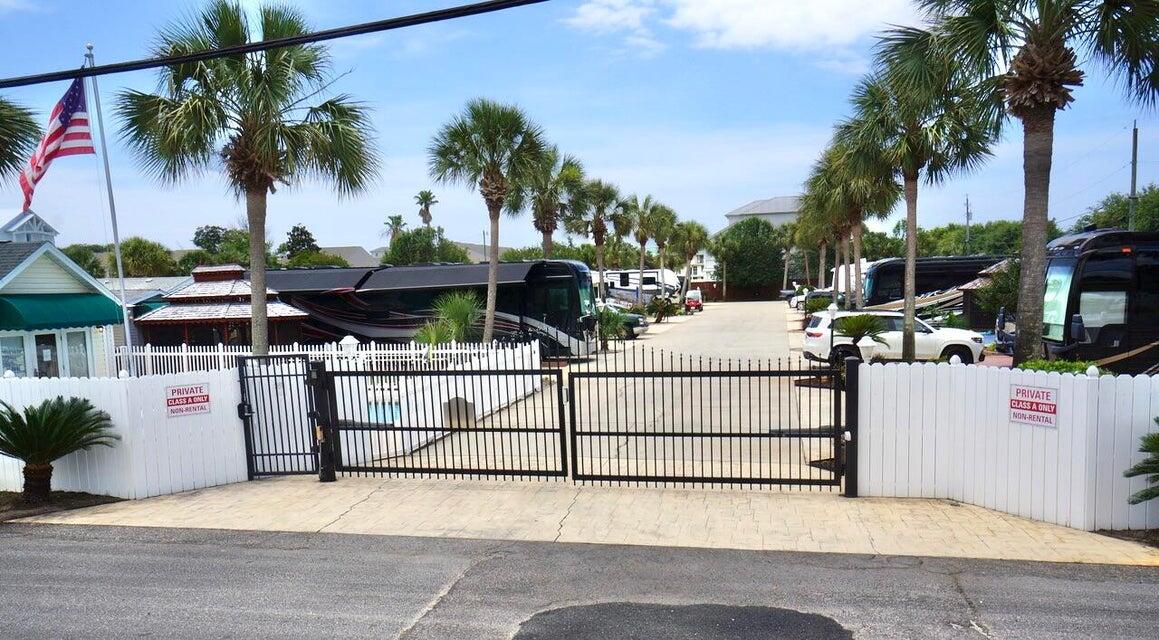 Oceanside is an Exclusive 'Class A'/'Super C' Motorhome Gated Community with a Pool & only 2 blocks from the Beach. Enjoy the privacy of the largest end lot located on the West side across from the pool. Lot 15 is a spacious lot with new landscaping & added composite decking outside the screened Gazebo. The storage house provides an ample area for all your toys and necessary
items for a long stay. The Gazebo has been completely refurbished with an upgraded metal roof, newly stained interior & exterior, new screening, and completely rewired. The storage building also has a new metal roof.  NON-RENTAL Gated Community of 15 lots with Palm trees, sprinkler system, pool, pool house with laundry, restrooms & shower. $2500 Yearly HOA Fees include grounds Keeping, Irrigation, Security Gates, Community Pool, facilities, Sewer, Water & Trash. Owners Pay Electric & Cable. 2 Pets with Breed Approval. NO 5th Wheels/Trailers. Only 2 blocks from 1 of South Walton's largest
Public Beaches with parking, public bathrooms and Pompano Joe's Beachside restaurant. The very best of the RV Lifestyle here on the Emerald Coast.
