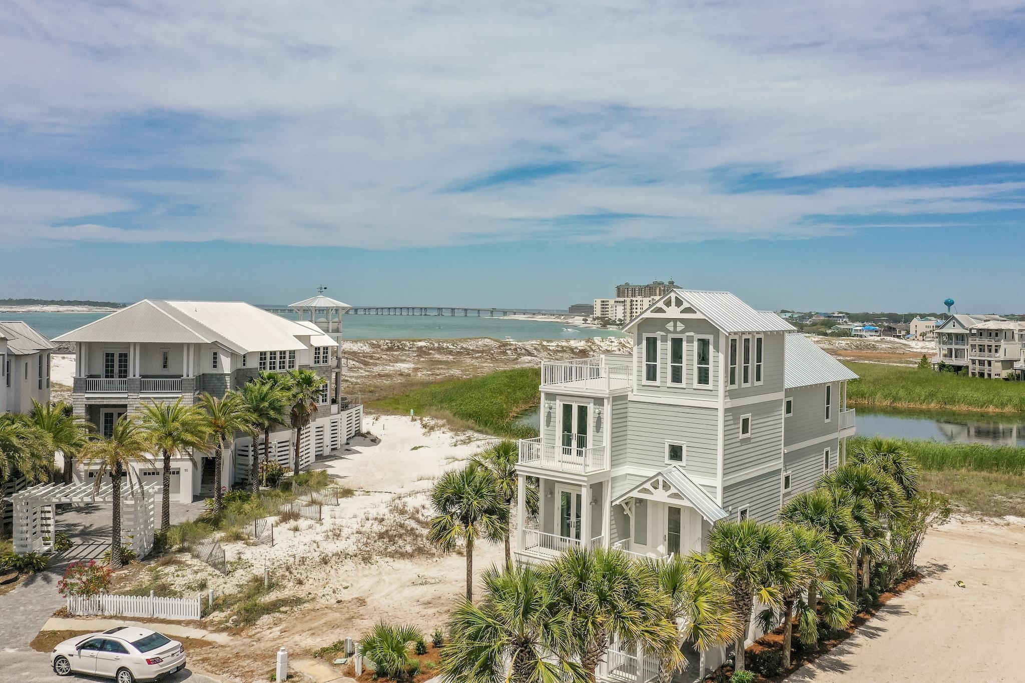 This home has been completely renovated. Almost everything inside and outside is brand new to include all new AC, electrical fixtures and plumbing fixtures, new roof, flooring and an improved floor plan with 4th bedroom plus a bunk room. The views from this house are absolutely amazing and overlook the Gulf of Mexico, East Pass and Destin Harbor giving owners breathtaking sunsets.
Destin Pointe is the only gated beach community to boast two separate beach experiences in one beautiful gulf front community.