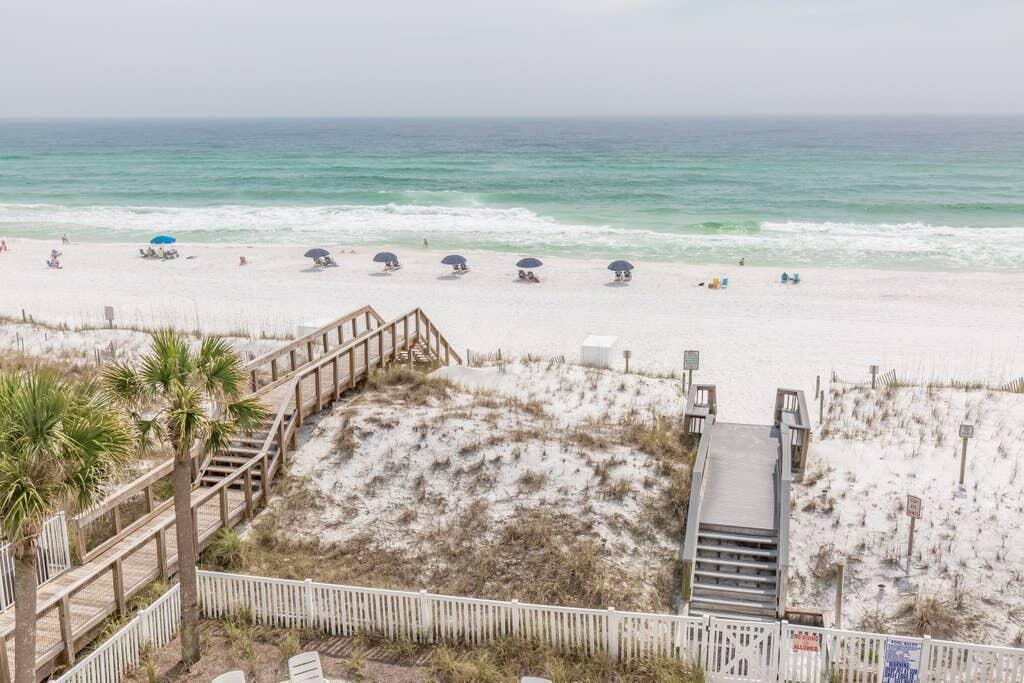 Discover your beachfront haven! Own a 1-bed, 1-bath condo with hallway bunks in a private 9-unit Gulf complex. Coastal luxury and convenience await as you step into an oasis radiating relaxation. Savor views and breezes from your east balcony, witness stunning sunrises and sunsets. Access a pool amid tropical landscaping. Furthermore, this condo comes with deeded beach access, meaning the Gulf of Mexico is your private backyard piece of paradise where you can enjoy direct and convenient entry to the pristine shoreline. Spend your days building sandcastles, collecting seashells, strolling the beach, watching dolphins frolicking in the surf or soaking up the sun. Whether you're seeking a permanent residence, a vacation rental or investment opportunity, this condo with elevator has it all! presenting an exceptional value and a true coastal living experience for the savvy buyer. Schedule a showing today and start living the beachside lifestyle you've always dreamed of!  To keep you cool during those hot summer days, there is a brand-new HVAC as of August 2023!