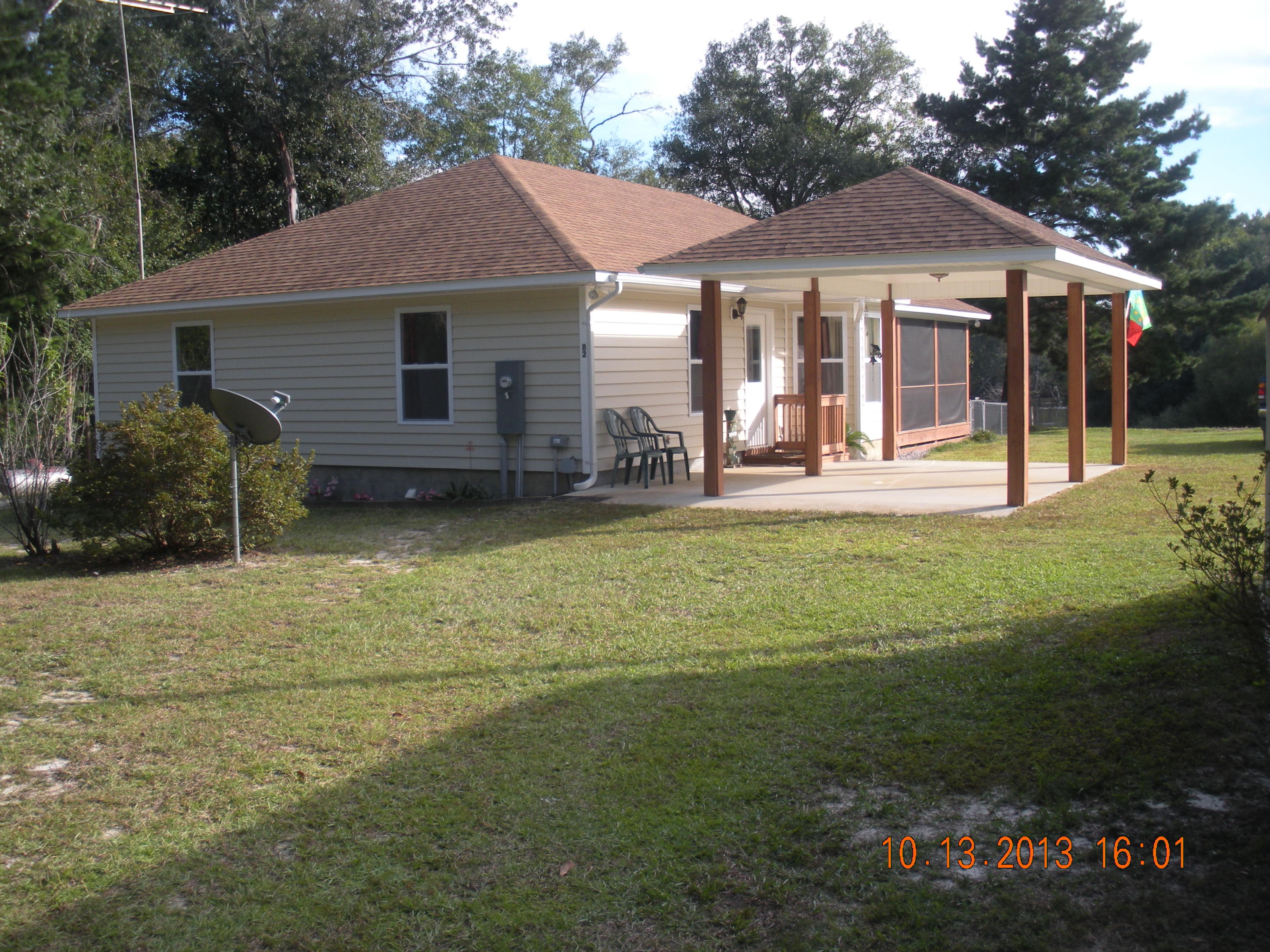 Find your serenity in this home located in quite area on Choctawhachee river with over 140 ft of riverfront! Cottage features family room with river view, cozy electric fireplace, great kitchen with pass thru window and large walk in closet in master bedroom. Wrap around screened porch is perfect for enjoying the view! Extra insulation was added by owner when building this home. There is plenty of storage: garden shed, covered mower storage, covered equipment storage, and custom built workshop with lots of shelves. This property is truly outdoors man paradise with its covered boat storage, boat ramp, large dock, and additional cabin that's located right on the water. It sleeps 3 and has bathroom with shower, water heater, and outdoor fish cleaning station for convenience. Adjoining lot on west side of the property is included. Owner had an aluminum sea wall installed on both lots. Pictures and description don't do justice for this property so call for your private showing today!
