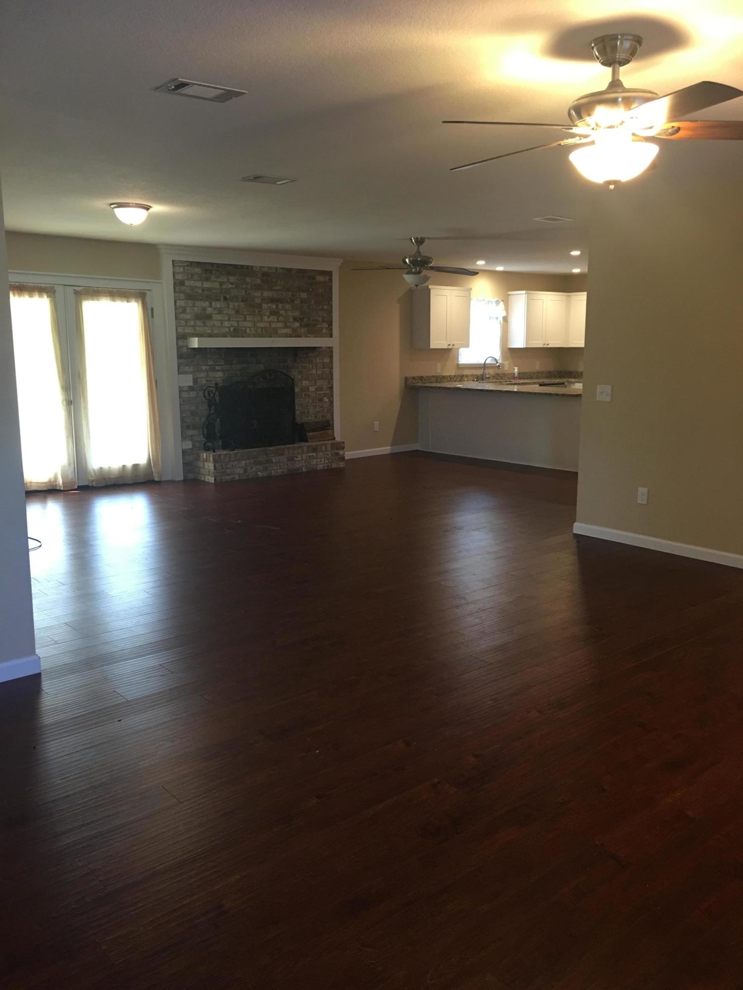4b/2b Unfurnished house in quiet neighborhood for rent. 2744 Total square feet with 1980 sq feet heat and cooled. Open floor plan. Family room has wood burning fireplace. Kitchen has granite counter tops and stainless steel appliances. Large mudroom has washer and dryer. Formal sitting area and formal dining room in addition to four bedrooms and 2 baths. Carpet in bedrooms, tile in bathrooms and hardwood throughout the remainder of the house. Large 2 car garage. Very nice fenced backyard. This house has been updated recently and is beautiful. It is 1/2 block from Boggy Bayou. There is room to store a boat or RV in the large driveway. Great for a family or roommates.