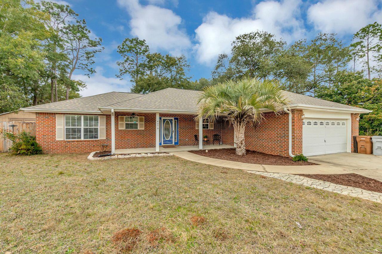 Seller is offering $8400 in buyers closings costs with full price offer only. Nestled in at the back of the neighborhood on a quiet cul-de-sac is this terrific home! With a brand new roof in 2020, covered patio, fire pit, and terrific 12x16 yard building, this is perfect place to raise a family and enjoy the outdoor lifestyle. As you enter the home, you're welcomed by beautiful engineered hardwood floors in the great room, dining area, and additional bedrooms. The great room features a lovely updated wood-burning fireplace as its focal point. The split floor plan offers privacy for the master suite which features a trey ceiling, walk-in closet, and ensuite bath with two separate vanities, garden tub, and separate shower.  When building the home, the owners designed what would have been the laundry room to be a large pantry with lots of extra storage. The laundry was moved into the insulated garage and a deep sink was added.