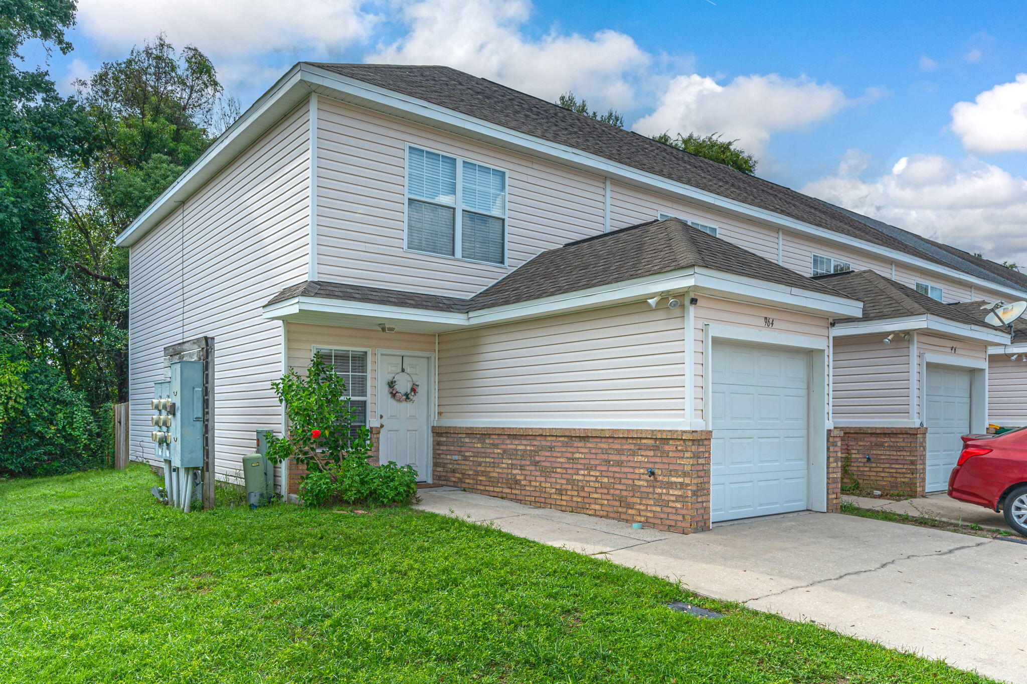Check out this 2 bedroom, 2.5 bath end unit that is located near military bases, beaches, and the FWB campus of Northwest Florida State College. Downstairs you will find a large livingroom overlooking the kitchen, a guest bathroom, laundryroom, and entrance to the single car garage. Head upstairs and you'll find two generously sized bedrooms each with their own private bathroom. The back of the home offers a relaxing patio and a newly fenced backyard. Call today to schedule your private viewing. Sellers to replace roof prior to closing.

Buyers to verify all facts deemed important.