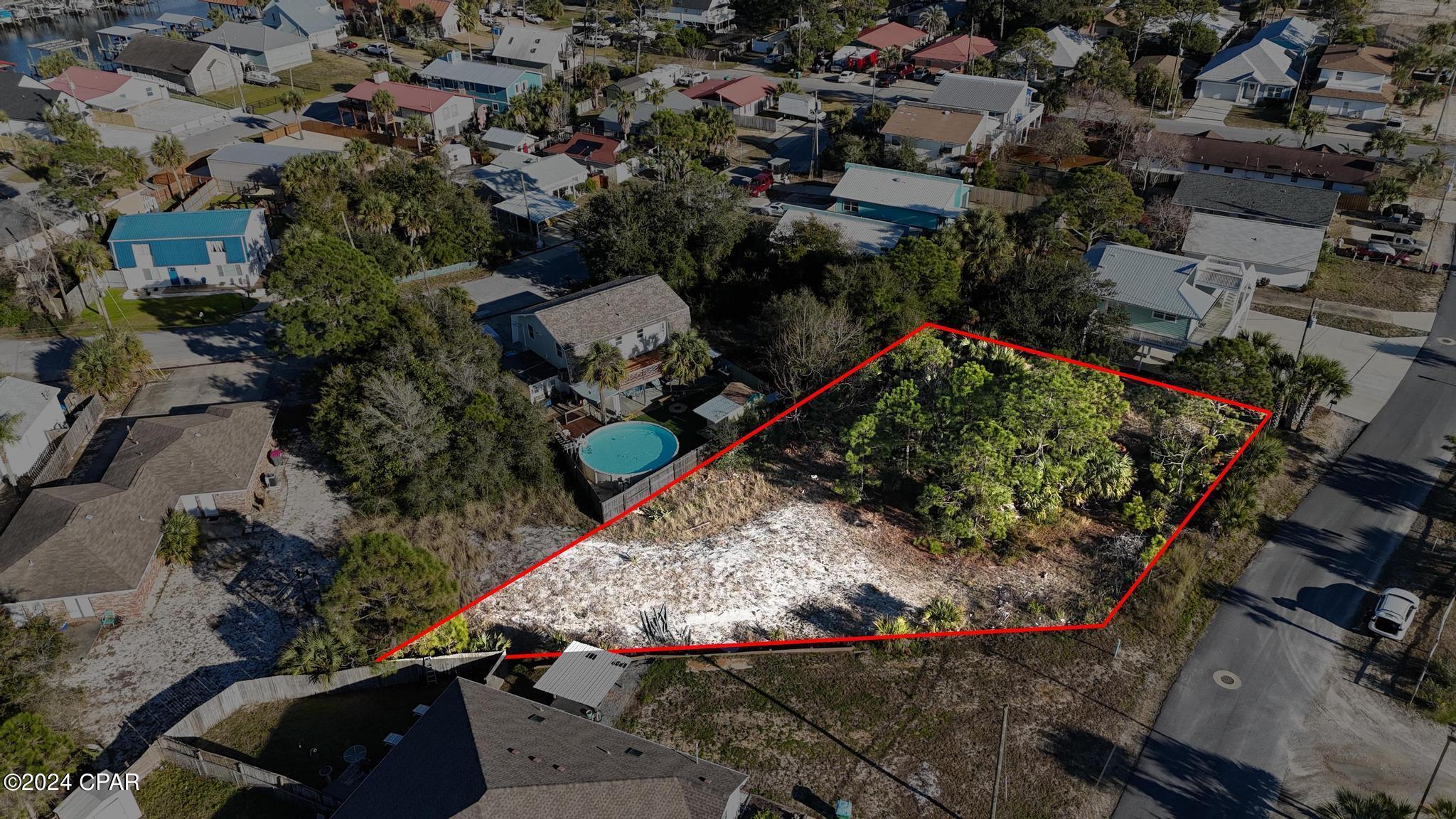 Welcome to a Builder's Dream Opportunity! Calling all Builders, Investors, and Developers! This expansive double-sized parcel lot is perfectly situated within walking distance to the World's Most Beautiful Beaches. For those with a passion for boating, trailer your boat down to the nearest South Lagoon ramps for easy access to the water.

Zoned R-3 Urban, this parcel presents a multitude of possibilities. Take advantage of the potential to construct a quadplex, providing an excellent opportunity for rental income. Alternatively, the lot can be divided into two parcels, allowing for the construction of two duplexes or two single-family homes - offering flexibility to meet various investment goals.

One of the most exciting features of this property is the ongoing development in the area. Public gravity lateral sewer lines are available down Beach Drive, starting at Silver Sands Rd and extending westward. This infrastructure enhancement not only adds convenience but also increases the overall value of the property.

Seize the chance to be part of this vibrant and evolving community, capitalizing on the unique potential this parcel holds. Whether you're looking to invest, develop, or build, this is an opportunity you won't want to miss. Act now and turn this blank canvas into a lucrative and rewarding venture!