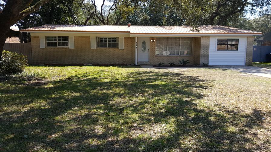 GREAT DEAL FOR THIS MOVE-IN READY HOME!! TWO MASTER BEDROOMS**NEW PAINT**UPGRADED KITCHEN**BUILT IN MICROWAVE**TILE FLOORS**CUSTOM TILED TUB**OVER SIZED UTILITY ROOM WITH CABINETS**WOODEN PRIVACY FENCE**METAL ROOF. The upgrades in this home will truly impress. Enjoy the privacy of the split bedroom floor plan which features a large bedroom with separate entry/exit. Outside the home is equally impressive. The backyard features an oversized patio with a 10x8 storage shed. All of this in an established neighborhood with mature landscaping.