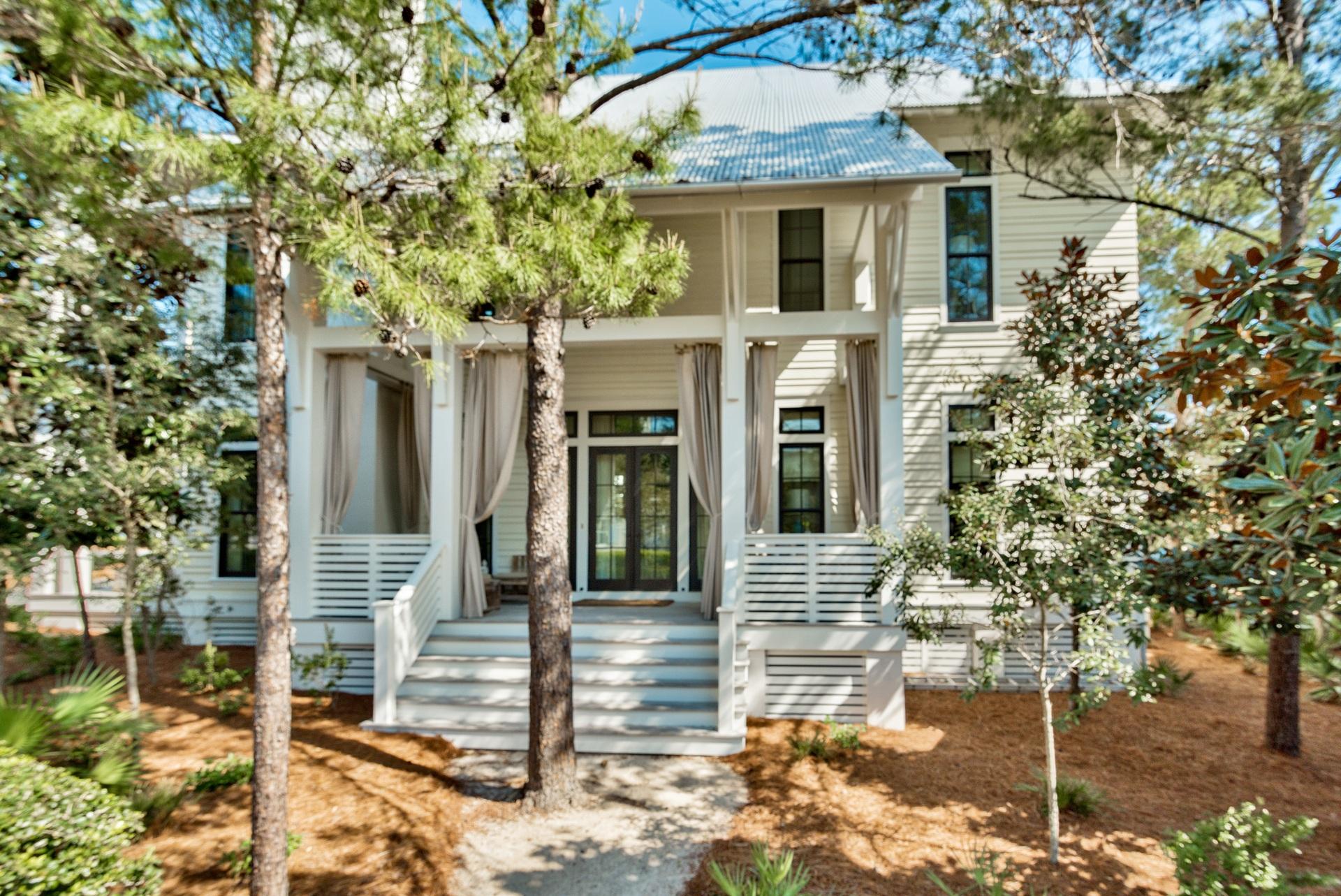 This one of a kind stunning home was design by Geoff Chick and built by Cole custom homes and is located on one of the largest corner lots in Phase III of Watercolor just across from the frog Pool. This home is accented with southern porches perfect to enjoy the peaceful and serene sunny Florida weather. As you enter this home you are greeted with immaculate attention to complete custom detail. The walls are Venetian plaster; with 12ft ceilings that are accented with exquisite solid antiqued oak beams, and antiqued oak floors. This one of a kind chefs kitchen has custom pecky cypress cabinets, beautiful leather counter tops, with all stainless steel top of the line appliances. This stunning kitchen is open to the spacious living, and dinning room that truly make this home perfect for entertaining or family living. The second floor is accent with over sized hallways and 12ft ceilings. This 5-bedroom 5.5-bath home has 4 bedrooms up and 1 located on the first floor all with private baths. The oversized master suite is located on the second floor with a sitting area, walk-in closet, and a truly luxury master bath suite with a double vanity, LARGE double head walk-in shower and separate soaking tub. The master bedroom has a large cover porch with French doors and sleeping bed to enjoy the seasonal breezes. This large lot has a carriage house with custom kitchen, sitting area and bedroom. The lot also has the ability to add on to the house or add a pool. The attic space also has room for additional square footage to be added; when the house was built they added extra truss support to be able to do so. Watercolor is located on 499 acres in the renowned South Walton Beaches; the picturesque WaterColor community was created with families in mind and offers the charm of small town life. Exceptional community amenities include several beautiful swimming pools, a gulf front beach club, nature trails, kayaking, canoeing, a fitness center, tennis, Camp WaterColor for kids, parks and green spaces. Buyer to verify all dimensions.