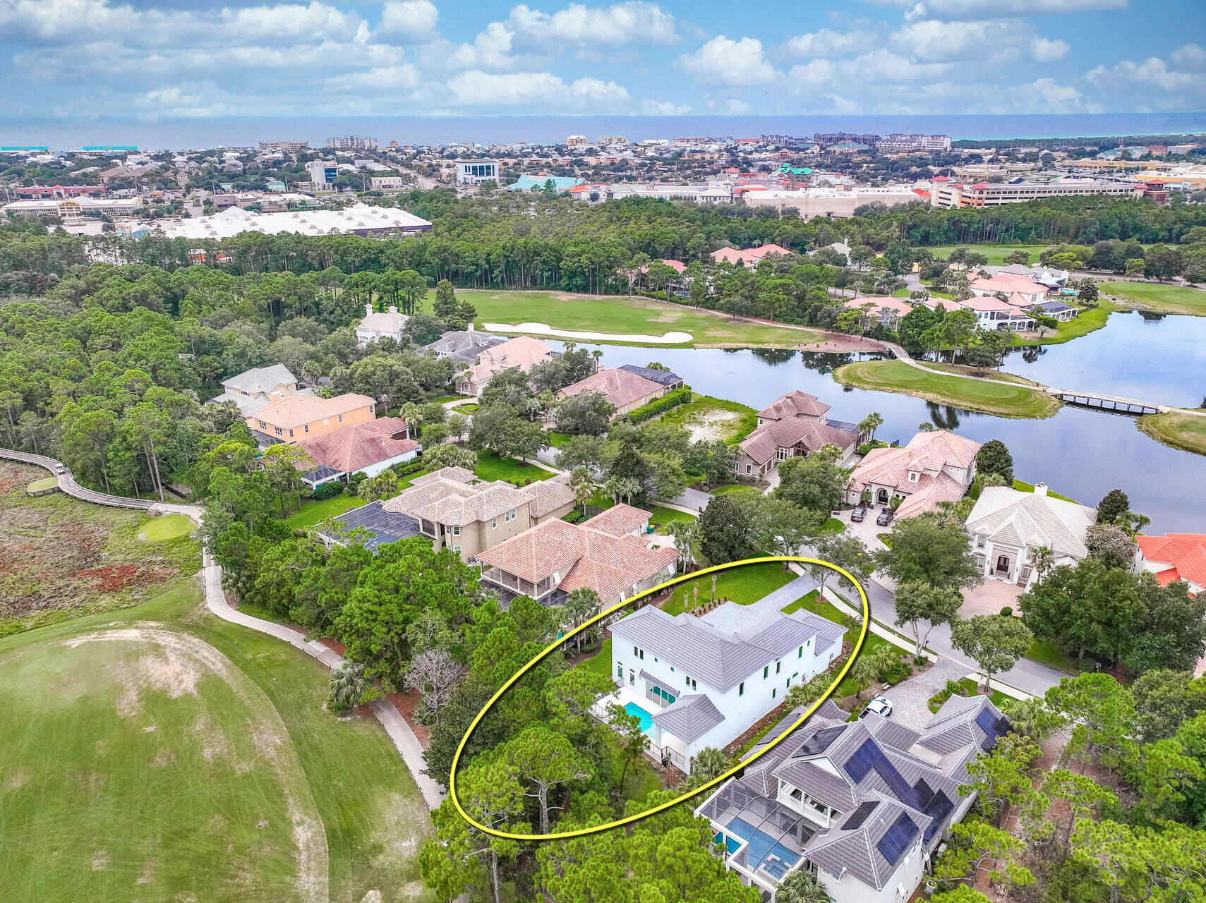Welcome to 500 Regatta Bay Boulevard! This gorgeous new construction fronts the top-rated golf course in Regatta Bay of Destin, Florida and is a spectacular home featuring five expansive bedrooms each with ensuite baths.  The first floor features a fabulous primary suite and accompanying luxurious bath, while the opposite wing offers a secondary private bedroom suite.  The imposing nature of the home is enhanced by massive glass panels by ES Doors and windows that allow for immense natural illumination of its voluminous interior.  The first floor also features an impressive kitchen including Wolf and Sub-Zero appliances, and living room, powder room for guests, and a pool with a summer kitchen under a relaxing loggia.  The oversized garage will accommodate... three cars and a golf cart. The home is oriented conveniently to the community's private rear gate, offering proximity to the smart boating club at Legendary Marine, and quite close to Regatta Bay's array of wonderful amenities, including but not limited to a large lap pool, tennis and playground. The community is ideally situated on the eastern end of Destin within easy reach of excellent rated schools, shopping, dining, entertainment and Caribbean-like beaches and the Emerald Green waters of the Gulf of Mexico.  The integrity of this property, including its phenomenal lot, building technology, and features, coupled with the lifestyle this home will offer you and your family, is an undeniable value at this pricepoint.  Please inquire for further details and to schedule a private showing.