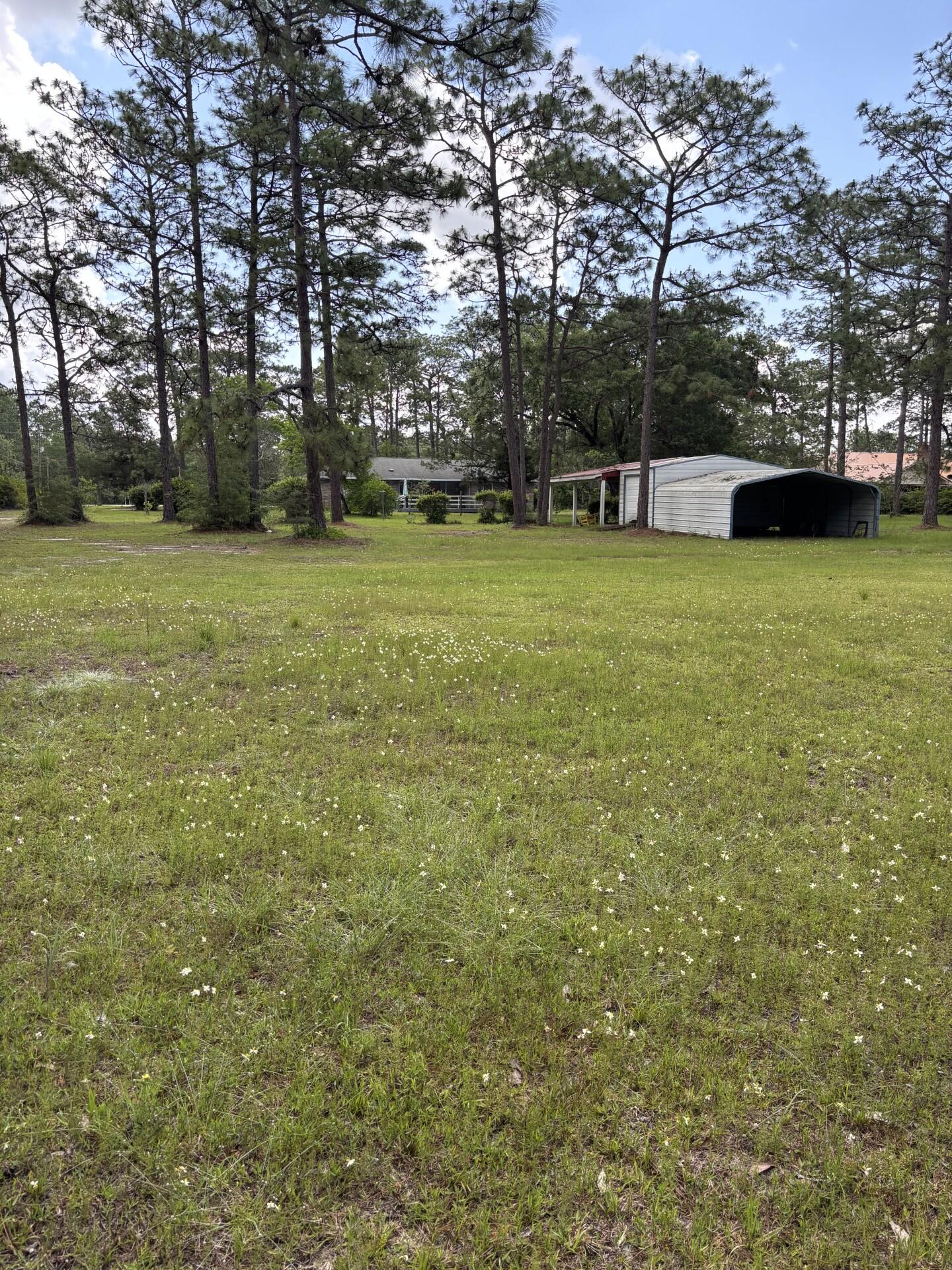 Price reduced! Located on Business Highway 331 in Freeport, Florida this property consists of 15+ acres with approximately 750 feet of highway frontage on Business Highway 331. Zoned R-3 High Density Residential plus a flood zone rating of X will accommodate up to several units per acre for future development as per City of Freeport land use guidelines. City water, city sewer. and power are available. Three schools, Freeport Elementary, Freeport Middle School and Freeport High School are located within 2 miles of this property. New middle school is being built in Hammock Bay is less than 4 miles away. This property includes a 2500 square foot custom built home and two large sheds for vehicles, boats or equipment. This unique property is located just 20 minutes from the Beaches of South Walton, 30 minutes from Eglin Air Force Base and only 15 minutes from Interstate 10 and DeFuniak Springs, Florida. Freeport Industrial Park with multiple businesses ais located approximately 1/2 mile from this property.  There are multiple parks and boat launch facilities for recreational pleasure within minutes of this location.