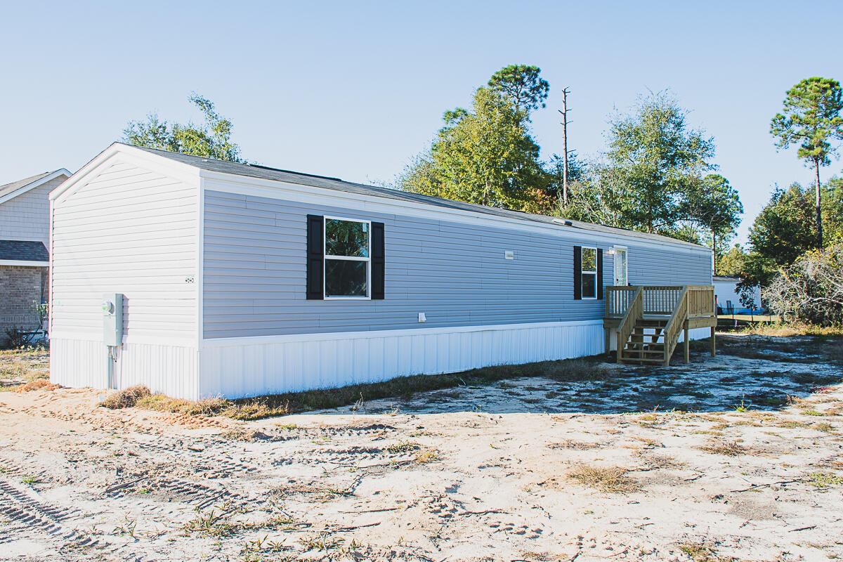 Available now.  Brand New Manufactured Home with easy access to the base, beaches and shopping.  3/2 floor plan has 1216 square feet.  Split floor plan with LVP flooring, spacious kitchen, large laundry, front and back decks.  Large lot and plenty of parking.  No inside smoking or vaping.  No pets allowed.