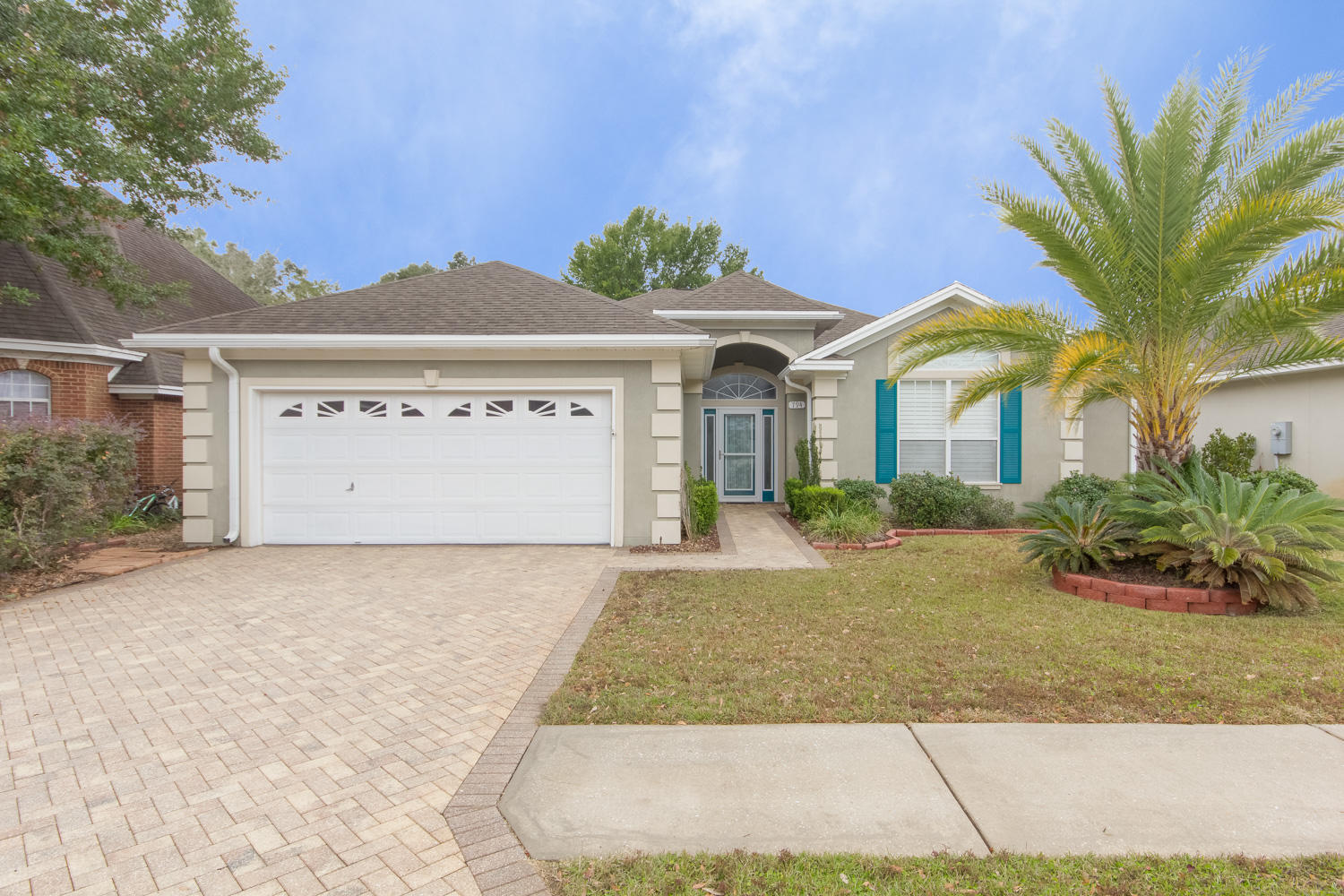 Come check out this great home in the prestigious gated community of Bridgeport Colony. As you walk into the large foyer you notice the spaciousness of the home. Light fills the house from the large arched window and transom windows around the front door. A convenient powder room is right off the foyer. The eat-in kitchen is well designed with a convenient center island/breakfast bar and Corian counter tops. Directly off the kitchen is the formal dining room perfect for entertaining. The living room is spacious with French doors out to the large covered patio. A fireplace puts a special focal point in the living room. The Master suite features tray ceilings, large bay window, walk-in closet, double vanities, and separate shower and whirlpool garden tub. Other notable features of this home Come check out this great home in the prestigious gated community of Bridgeport Colony. As you walk into the large foyer you notice the spaciousness of the home. Light fills the house from the large arched window and transom windows around the front door. A convenient powder room is right off the foyer. The eat-in kitchen is well designed with a convenient center island/breakfast bar and Corian counter tops. Directly off the kitchen is the formal dining room perfect for entertaining. The living room is spacious with French doors out to the large covered patio. A fireplace puts a special focal point in the living room. The Master suite features tray ceilings, large bay window, walk-in closet, double vanities, and separate shower and whirlpool garden tub. Other notable features of this home include high ceilings, California style Plantation shutters, 2 car garage, laundry room with gas and electric hook-ups.
The community of Bridgeport Colony features a security gated entrance during evening hours, sidewalks throughout, and a gated community pool with bath houses. This community is centrally located near shopping, both bases and the white sand beaches of Okaloosa Island.