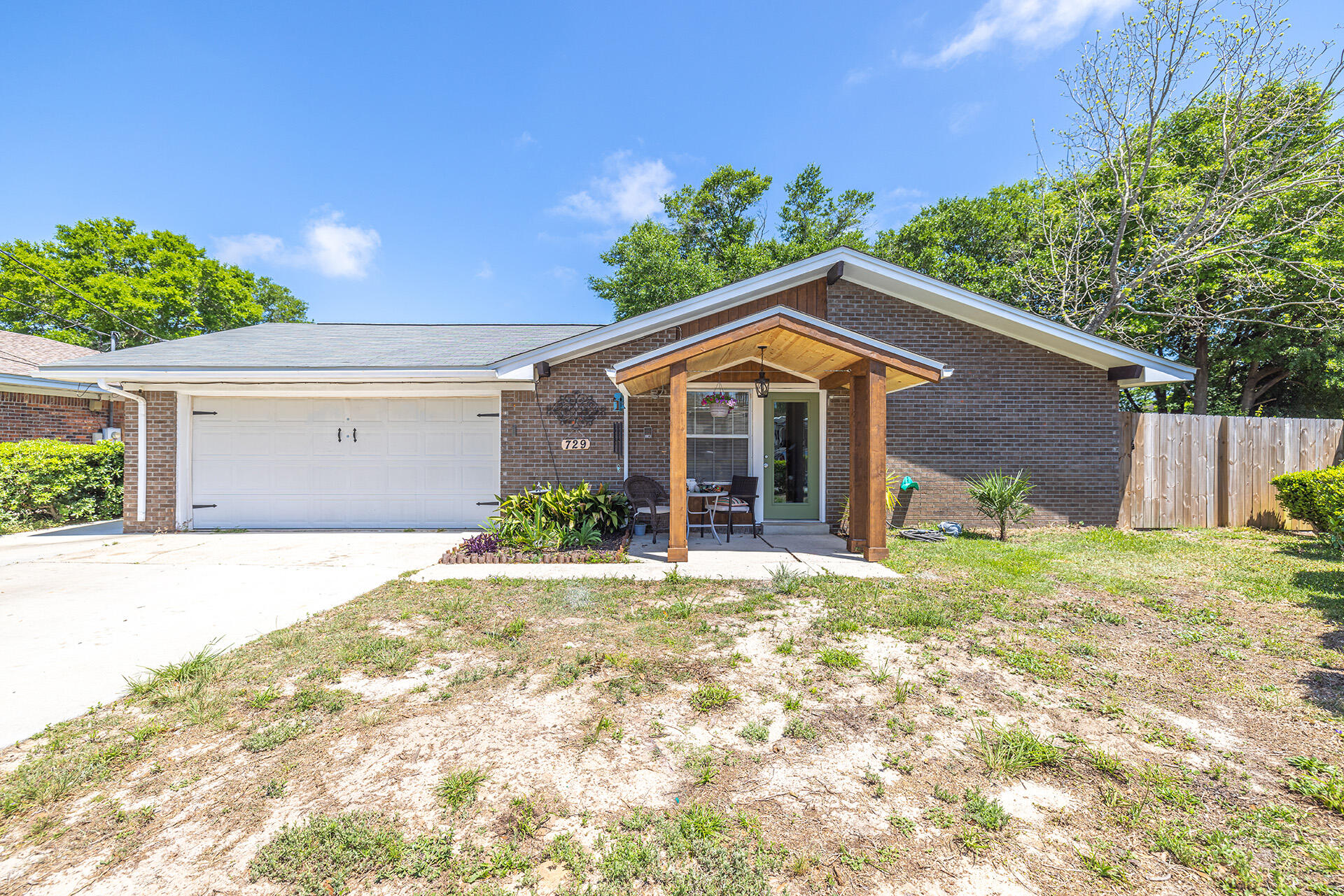Newly renovated and move-in ready! This home is located on a quiet cul-de-sac in the heart of Fort Walton Beach. As you approach the entrance you'll first notice the nicely stained wooden awning over the front porch. Moving inside there is LVP throughout the main living areas with new paint, trim, doors, hardware and light fixtures throughout the rest of the home. In the kitchen you have new granite counter tops, under-mount sink, backsplash, and no wasted space for cabinet storage. The finished wood burning fireplace and trim brings the family room together. A large master suite is appointed with a walk-in closet and new vanity in the bathroom. With the split floor plan, you find the second bath and two more well apportioned bedrooms down the hall. The back yard boasts an outdoor patio, privacy fence and plenty of room for pets or play. An oversized garage brings it together with room for the toys. New Impact windows for the entire home have been ordered and are scheduled to be installed in September!