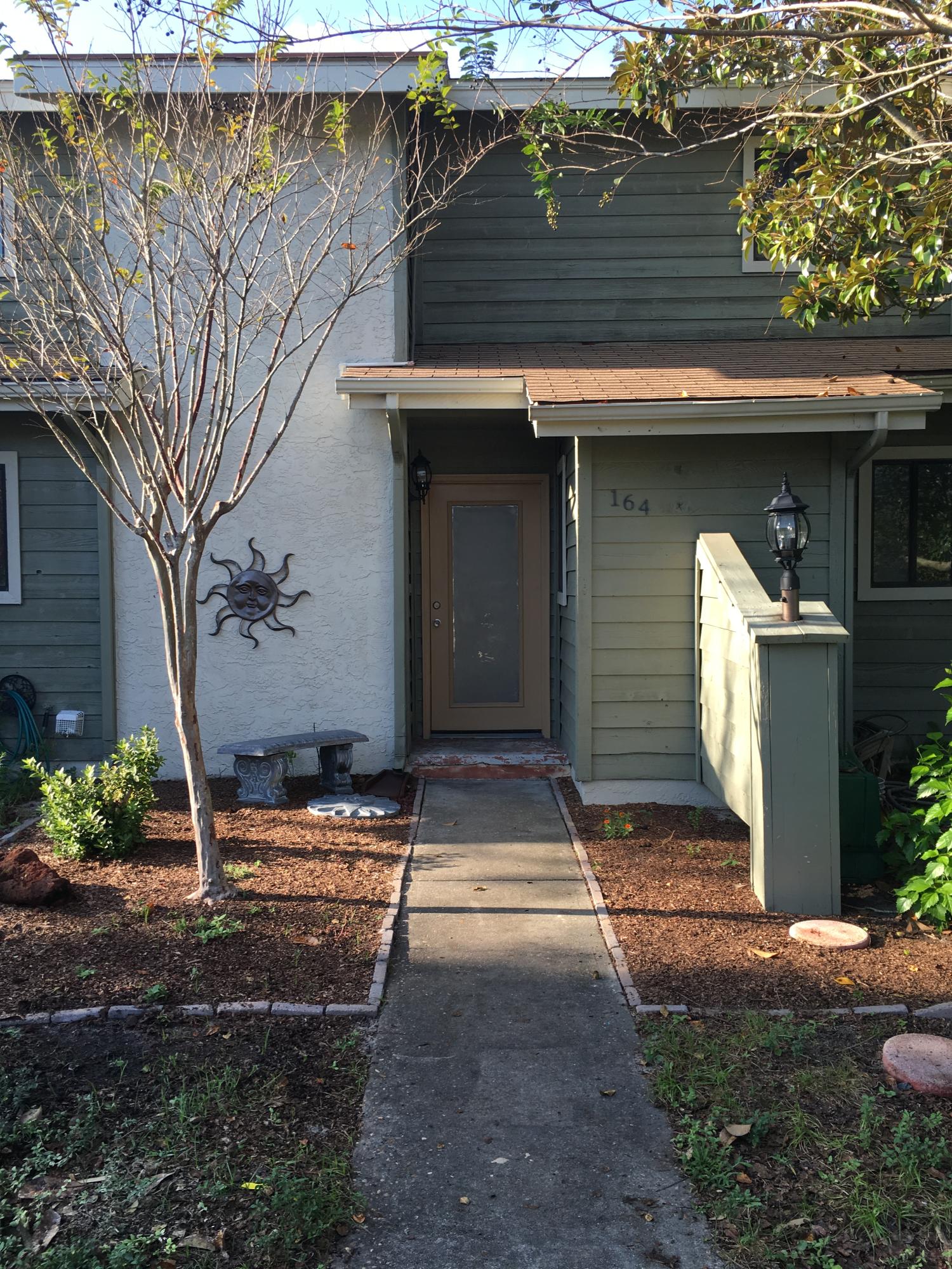 Beautifully updated 2 Bedroom, 2 Full bath town home in Destin! Property has beautiful tile floors throughout the lower level with an additional enclosed Florida Room for extra living space. Kitchen has nice counter-tops and stainless steel appliances, breakfast nook plus a breakfast bar. Downstairs full bathroom has new vanity and sink. Upstairs is carpeted with spacious master bedroom and guest bedroom. Full size washer & dryer include. It offers a small fenced back yard for your small pet or children.