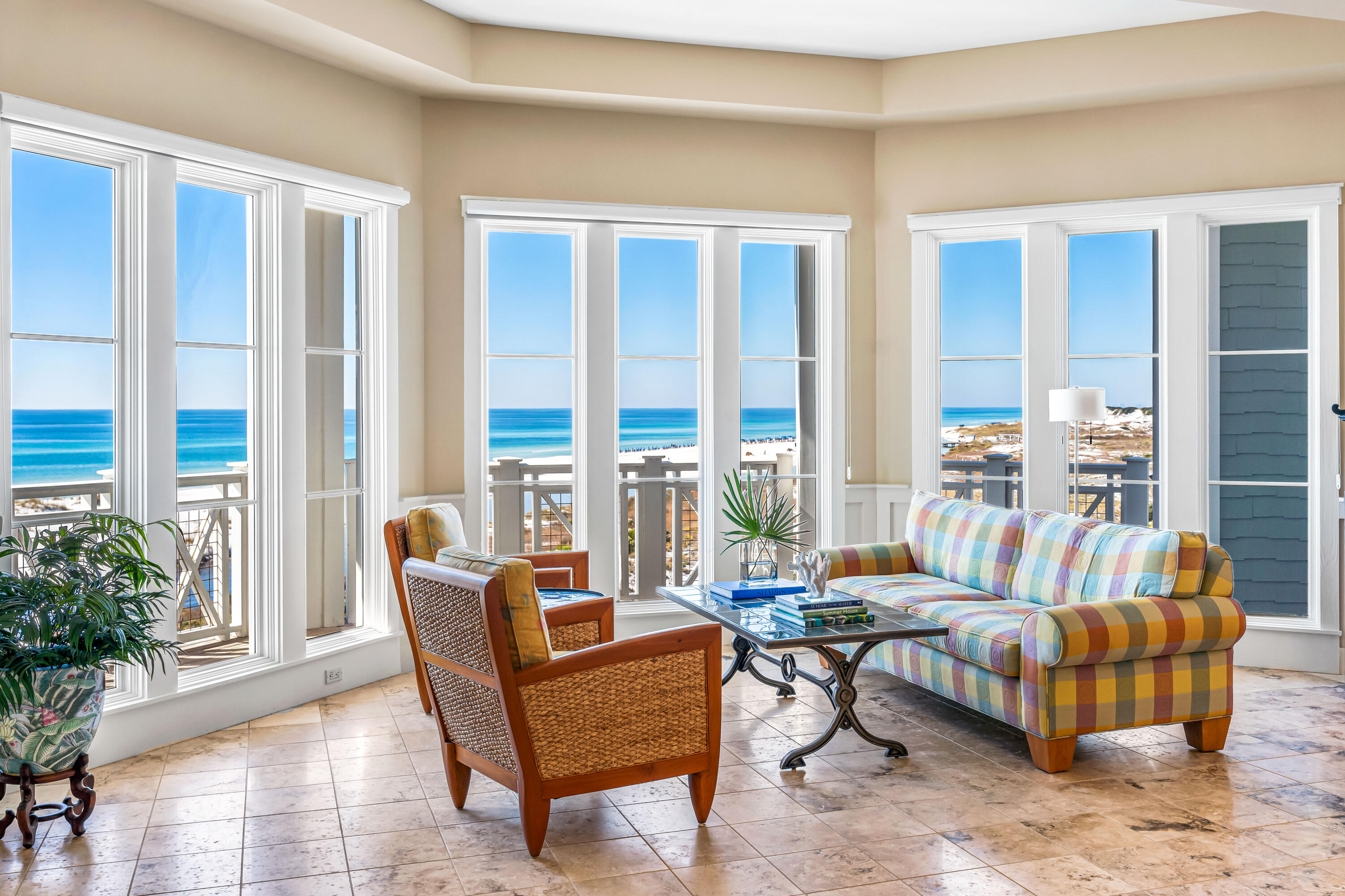ACTIVE UNDER CONTRACT WITH 72 hr KICK OUT. RARE top-floor PENTHOUSE gulf front masterpiece on a private & secluded beach. Offering breathtaking panoramic forever Gulf Views. This  South West Facing unit has a wrap-around porch that provides sunrise and sunset views- grab your coffee in the morning or cocktail in the afternoon to enjoy this piece of paradise.  In pristine condition, meticulously maintained, and never rented.  This unique & expansive open floor plan has 12-foot ceilings throughout and lives like a single-family home with gulf & dune lake views from all living areas.  The owner's suite expands on the east side with southern Gulf views, a sitting area, & private access to the balcony via French doors. Primary bath with dual vanities, separate shower, soaking tub, and huge walk-in closet with custom shelving system. Jr Primary features a floor-to-ceiling bay window & access to the balcony.  The kitchen features granite countertops, a pantry, stainless steel appliances, and a Viking Gas Range. This home is located directly off the elevator- so no worries about bringing up your luggage or groceries or little ones!  The detached oversized 1 car garage allows for additional storage. Custom Wood Shutters & Window treatments. 2 minute walk to the private sandy white beach & pool. Watersound is situated on  256 acres nestled discreetly behind towering dunes along the Gulf of Mexico. A rare coastal dune lake provides a unique amenity to explore and enjoy. This luxury community is gated  & directly across from Deer Lake State Park. Other amenities include 24-hour security, multiple pools, a fitness center, pedestrian paths, pocket parks, a dog park, and trails. Just outside the gates are multiple town center communities offering dining establishments, shopping, and live music. The views are truly hard to describe and capture in photos. You must see them for yourself. Sunset showings are available.