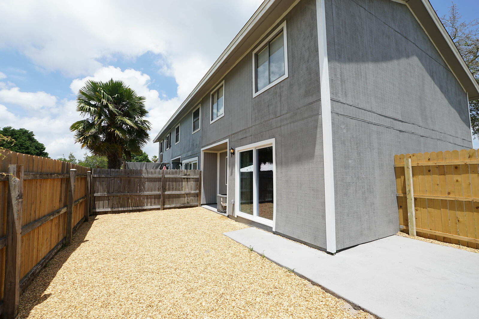 NO HOA! 
Large corner lot townhouse located in the heart of Destin. This townhouse has 1 bedroom, office with a full bathroom plus 2 full baths, open floor plan, and the unit is very clean. The unit features luxury vinyl plank throughout, fresh paint, light fixtures, inside the laundry room, ready to move in and enjoy the sunshine in the privately fenced backyard! Convenient to the Destin harbor, main street water park, schools, stores, and restaurants, the beautiful white sandy beaches, and military bases. NEW ROOF, NEW A/C.