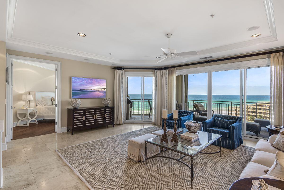 Previously featured in Coastal Living magazine, this west-end villa in the south tower of gated Grand Dunes boasts sweeping gulf views and the building's highly-coveted ''50 stack'' floor plan. Featuring four beds, four baths and 2,822 square feet of living space, this exquisite 5th-floor unit sits atop two floors of enclosed gated parking and is accessible to you via a private, coded, high-speed elevator that opens directly into your foyer. Well maintained by its current owners, enjoy a spacious living area with gulf views and a kitchen with new quartzite countertops and tile backsplash and a generous island with seating. Other notable features include fresh paint throughout, travertine flooring in the foyer, living areas, hallways and baths, custom drapes, gas grill, tailored living master closets with a built-in safe, and updated pendant lighting. Enjoy the Emerald Coast's famous sunsets from a southwest-facing spacious balcony accessible from both the primary living room and owner's suite. This rental-restricted community is replete with luxurious amenities including a stately porte-cochère entry, a grand lobby with an elegant informal bar and seating area, a private owners' lounge that overlooks the gulf, a conference room, two suites for overflow guests and ample underground parking. Two hundred feet of private beach with no public entry as well as concierge-type beach services make a day in the sand practically perfect. On-site amenities include a gulf-front exercise room with new Life Fitness equipment, tennis courts, an oversized freeform pool with cascading waterfall and hot tub on the lower deck and a private heated pool on the upper deck, all nestled behind a secure gate with lushly landscaped grounds. Renovations to this building are ongoing and include restoration of the exterior facade, waterproofing and sealing, concrete and stucco repair and replacement of windows. This unit is being sold fully furnished minus some artwork/furniture pieces and personal items.