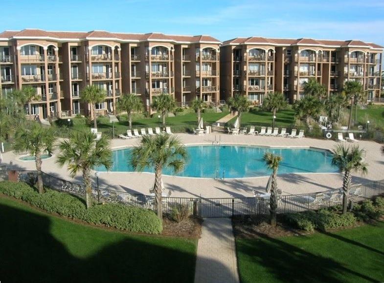 The pinnacle of beach living, this impressive condominium at Mediterranea is truly deserving of the term masterpiece. Designed with an island theme, this 2 bedroom (both king sized) 2 bath condo is incomparably luxurious and timeless in its elegance. Enjoy 3 private balconies, a deeded garage parking space, a Gulf view/front master suite and a beautiful gourmet kitchen featuring granite counters. Partake in all the. resort style amenities Mediterranea has to offer you and your guests, including nearly 500 feet of gated beachfront, private beachfront observation gazebo, fully-furnished 3,000 square foot community room with full kitchen and terrace overlooking the Gulf, fitness center, tennis court and nearly 3,000 square foot heated pool and spa surrounded by the 7,000 square foot pool deck and lush landscaped grounds.  Excellent investment with established rental history.