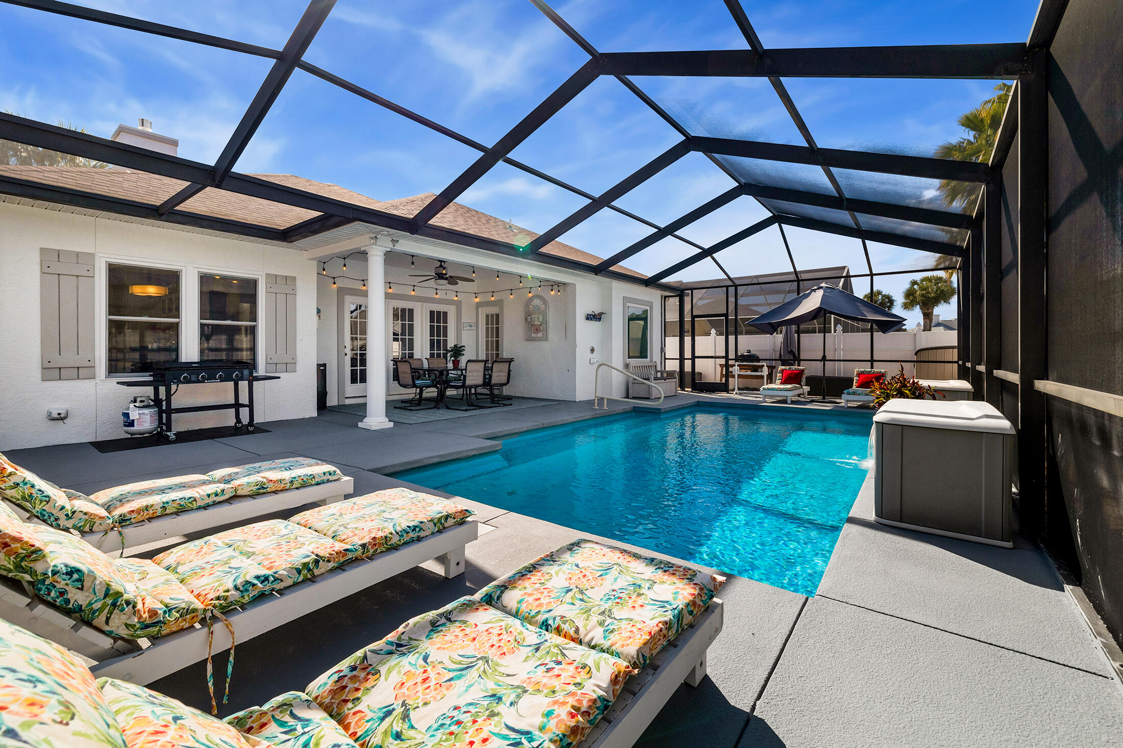 THIS COULD BE YOUR HOME! Saltwater Pool, STAR EV (electric vehicle), and Prime Location in Summer Breeze! Nestled on an expansive corner lot in the highly sought-after Summer Breeze neighborhood, this CUSTOM BUILT, 3-bed, 2-bath home offers the perfect blend of comfort, style, and convenience. FURNISHED and move-in ready, this home boasts spacious living areas w/engineered wood, HIGH-QUALITY FINISHES, and great amenities. As a bonus, it comes with the coolest little STAR EV, making it easier to get around town! Step outside to your own private oasis—featuring a SPARKLING SALTWATER POOL that is fully ENCLOSED for year-round enjoyment. The pool area is ideal for relaxing or entertaining, while the spacious side yard offers plenty of room for grilling & additional storage.  Located just a short distance from Panama City Beach's stunning white-sand beaches, and new entertainment venues, such as Top Golf, McGuire's and Dolly's Stampede! This home provides the ultimate coastal lifestyle. Situated in a GOLF CART-FRIENDLY community, getting around is a breeze, whether you're heading to the beach, local shops, or restaurants. With its beautiful pool, charming EV, and unbeatable location, this home truly has it all! FEATURES AND UPGRADES: 
- FRESHLY PAINTED- Inside, outside, and including the pool deck. 
- HURRICANE WINDOWS installed in 2022. 
- NEW ROOF(2018). 
- HEAT PUMP/AC for year-round comfort. 
- WATER HEATER replaced in 2021. 
- KITCHEN REFRIGERATOR (2023). 
- FIBERGLASS SALTWATER POOL with fountain. 
- POOL ENCLOSURE 
- NEW POOL PUMP (Nov. 2024). 
- REMOVABLE BABY GATE for pool and porch areas. 
- LAWN IRRIGATION PUMP with new control heads and air pump tank (July 2024). 
Whether you're hosting friends, relaxing by the pool, or enjoying quiet time with family, this home provides the perfect setting for every occasion.