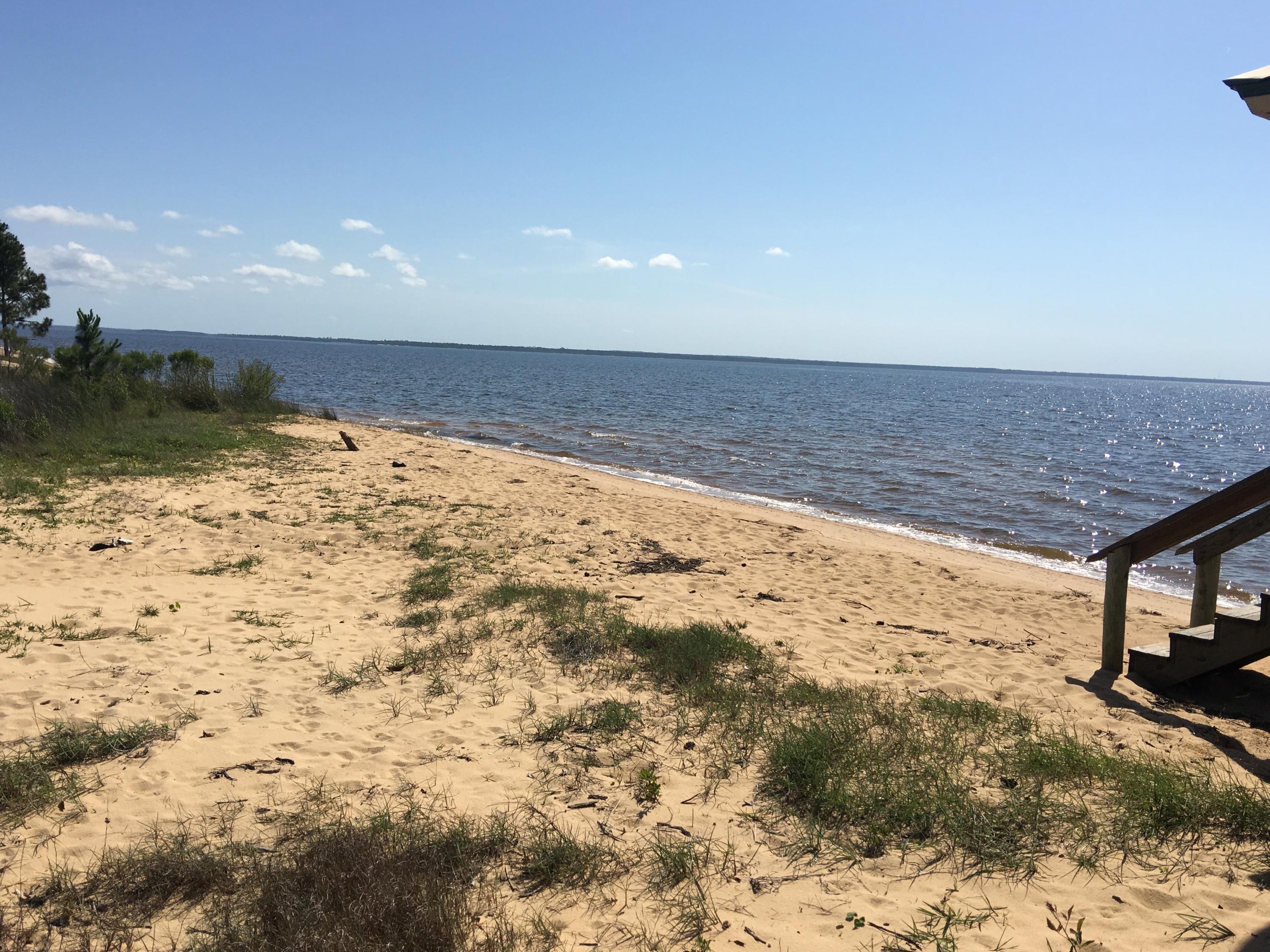 Lot 1, Block E, Sea Pines s/d and southerly 1/2 of adjacent ROW (vacated) Bayview CT adjacent to lot - Land