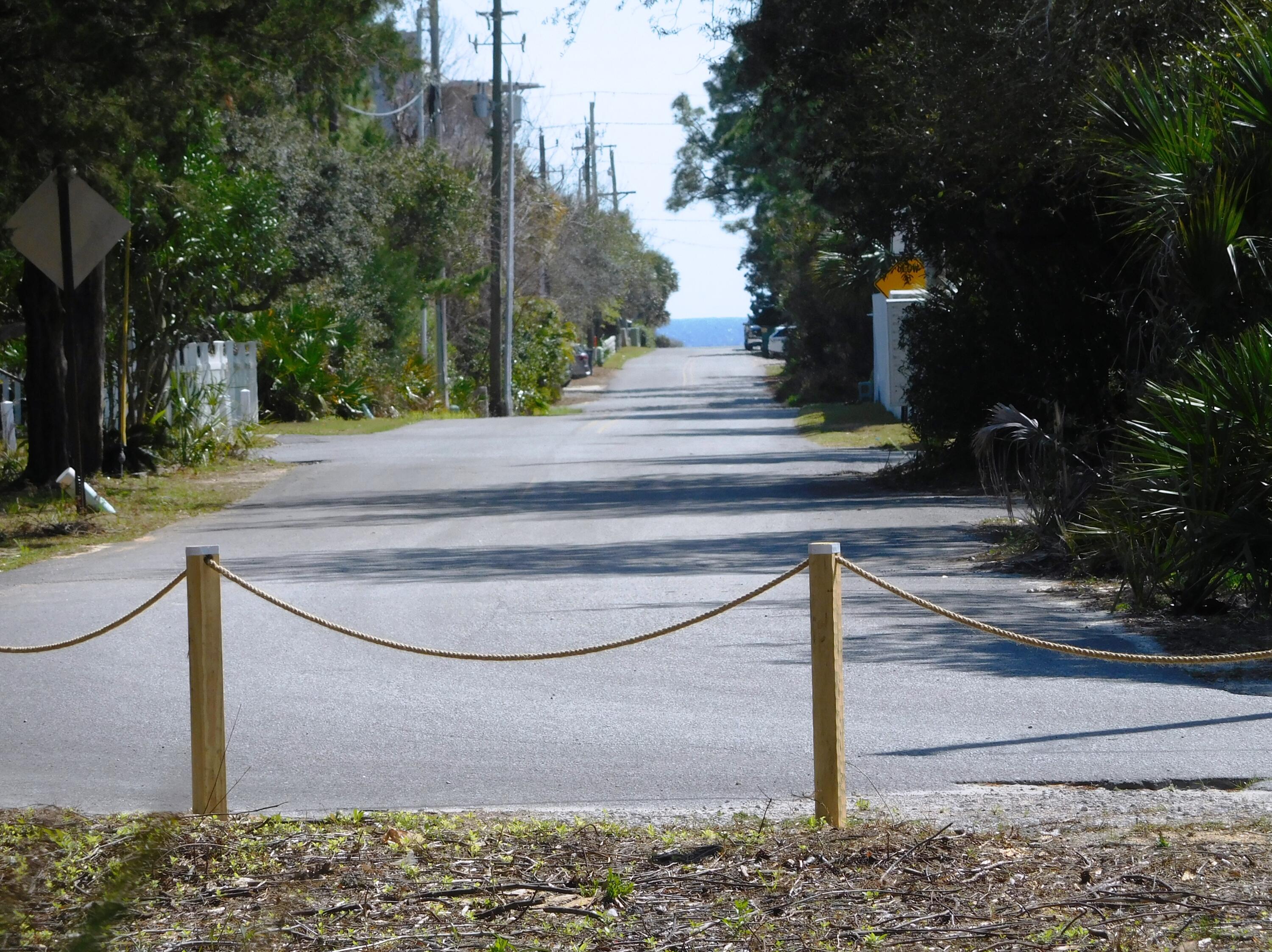 Beautiful, cleared lot located in a quiet area in the heart of Seagrove Beach. East side of lot is bordered by state forest and lot elevation is 33 feet above sea level.  Located 600 yards from the white sandy beach and the emerald waters of the Gulf of Mexico. Enjoy local shops and dining along 30A along with the hiking trails of the Point Washington State Forest.  This lot has tons of potential!