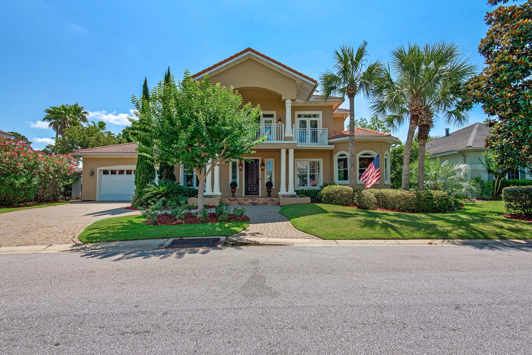 Stunning executive home in the exclusive gated neighborhood of Sunset Beach - Luxury in Bluewater Bay - Solid concrete and stucco construction - High end finishes with spacious rooms and sought after Location! Welcome home to 1393 Sunset Beach Drive! Nestled within the private community of Sunset Beach deep within Bluewater Bay of Niceville, this home exudes luxury on a private lot within walking distance to the community pool and club house ON THE BAY! Beautiful mature landscaping, an oversized paver driveway and a soaring 2-story elevation create the breathtaking Mediterranean curb appeal for this stunning home! 

Entering through the custom solid wood door is a large foyer with tile flooring and views directly to the back yard with golf course and water views. A powder room is tucked in under the stairs that were custom built with wrought iron railings and hand laid walnut stairs to coordinate with the flooring in the living areas. Directly inside is the grand family room with cathedral ceilings, a gas fireplace, and a solid wall of windows and doors to the backyard oasis. A formal dining room creates a private setting for entertaining or holiday meals together with friends and family. The gourmet kitchen is a dream with custom Taj Mahal solid stone countertops, beautiful warm tone cabinets, 2 sinks, stainless appliances and a Thermidor gas range and cook top. The breakfast bar and room allow for more room to dine and entertain within the kitchen space. The built in desk and massive walk-in pantry ensure plenty of space for even the pickiest kitchen gadget collector! A separate office space includes double doors and privacy on the first floor while the Master suite boasts a hotel-like ensuite, walk through custom closet and an inviting main bedroom and sitting room. 

On the second floor you'll find 3 additional bedrooms, 2 full bathrooms, and large landing with built-in bookshelves. One of the additional bedrooms features a large living space with panoramic views over the lake and golf course. 

Outdoor living space abounds with a second story covered porch with access from 2 of the front guest bedrooms, a screened sun porch off the breakfast room - complete with full curtains and access to the backyard. Off the breakfast room and great room is an oversized covered back patio with room for grilling, a lounge area, and space to relax lake side with no other homes in sight! 

Make plans to see this unicorn of a home today! 
Roof - 1998 tile, WH - 2018, HVAC 2014/2008
Currently covered by Terminex - seller not responsible for transfer
Current flood insurance CAN transfer.