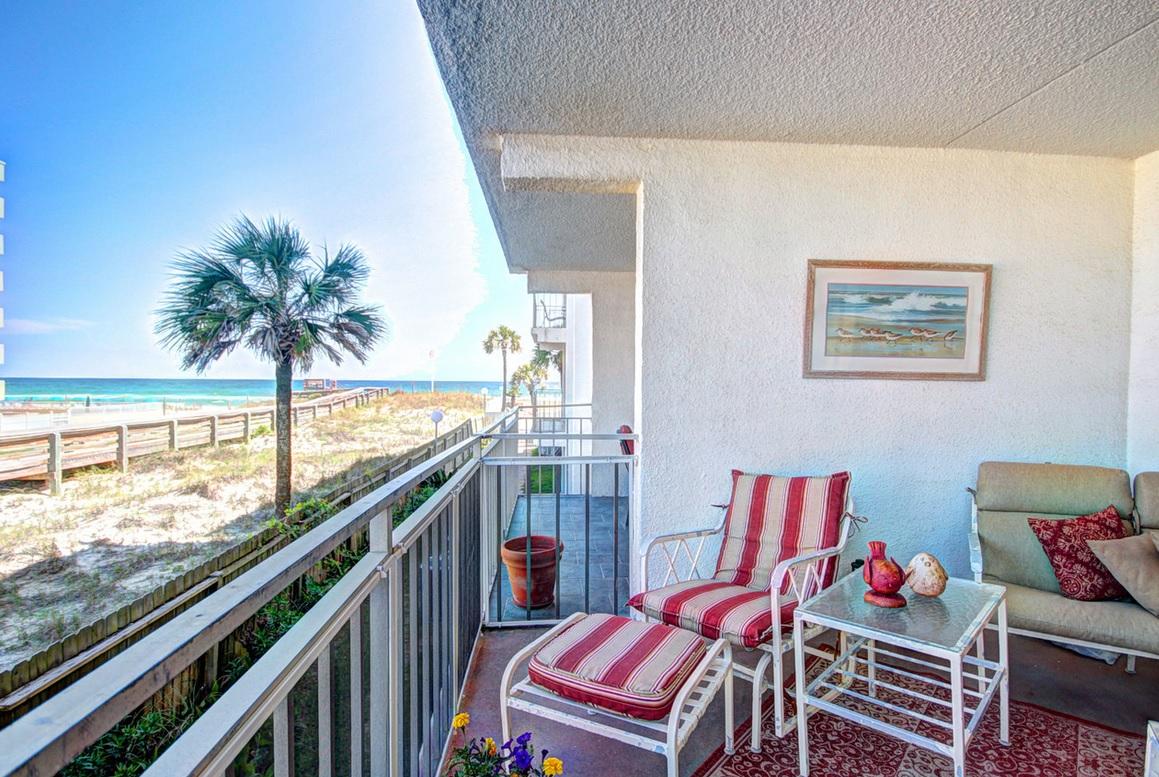 The complex and pool is gulf front, and this unit is one that is very close to the gulf on the east side of the building. From the well positioned balcony and living room you will get a very good view of the Emerald Green waters of the gulf, palm trees, and the white sandy beaches.
The condo has several comfortable & favorable attributes which include a built in office/storage space (which could be converted into a bunk room), built in entertainment bar/shelving, and rarely used appliances.