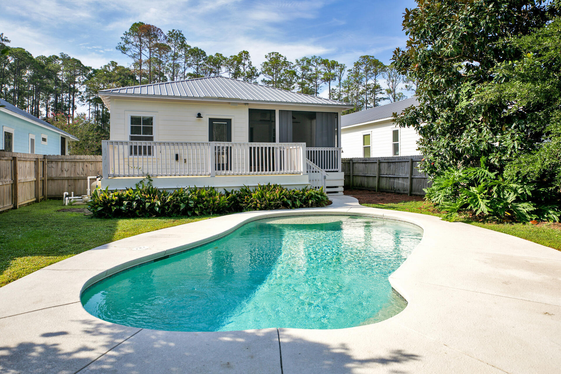 The MOST ADORABLE COTTAGE on the block! This 3 bedroom home is located in the highly desirable community of Point Washington and is one of the very FEW homes that has a PRIVATE POOL! The bohemian chic home has an open concept living, dining and kitchen with durable bamboo hardwood flooring flowing throughout the main living spaces and white ship lapped flanked walls. The two guest bedrooms are directly off of the living area with a bathroom in between. The large master bedroom has new carpet, a spacious walk-in closet, and en-suite bathroom. Have coffee off the newly refreshed deck located directly off the master suite, overlooking the dreamy backyard and pool. The home is located in a quiet NON-HOA community yet close to everything that 30A has to offer!! This home won't last long!