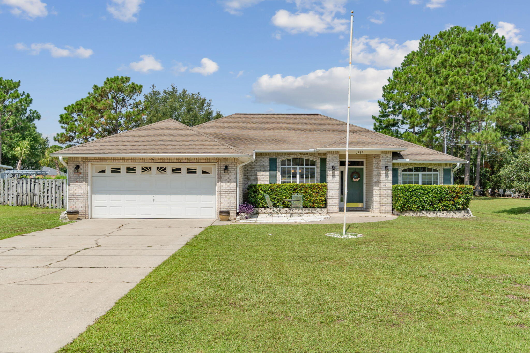 **DO NOT USE AS A COMP** See sale notes. 

Welcome home to this spacious all brick beauty in Holley by the Sea featuring 3 bedrooms in a split floor plan plus a formal dining room AND a huge 16x29 interior bonus room on a 0.46 acre lot! You'll love the convenient location and access to the multimillion dollar amenity facilities (indoor and outdoor pools, fitness center, playground, etc) for only $515/year! More Enter through the front door and appreciate the vaulted ceilings and the tile throughout all the common areas and bathrooms, and the new carpet in the bedrooms! The well appointed kitchen features tasteful cabinetry and quartz countertops along with stainless appliances. The interior laundry comes with a washer and dryer along with an extra storage closet, and leads to the two car garage. Enjoy relaxing in the owner's suite complete with brand new carpet, a trey ceiling, and a large master bath featuring an oversized walk-in shower, double vanities, a private water closet, and a walk-in closet. On the other side of the house you'll find two nice sized bedrooms and ample closet space with a full bath between them. Off of the large living room is a fantastic bonus room perfect for whatever needs your family has! Home office? Playroom? Homeschool room? Game room or man cave? Home gym? Or all of the above? You'll definitely enjoy this area and the extra storage space off the back of the room. Off the bonus room you'll step out to find a fantastic fully fenced in backyard complete with a yard storage building, fire pit, and little playground all to convey. Enjoy a short drive to Navarre's beautiful beaches and an easy commute to Hurlburt Field!