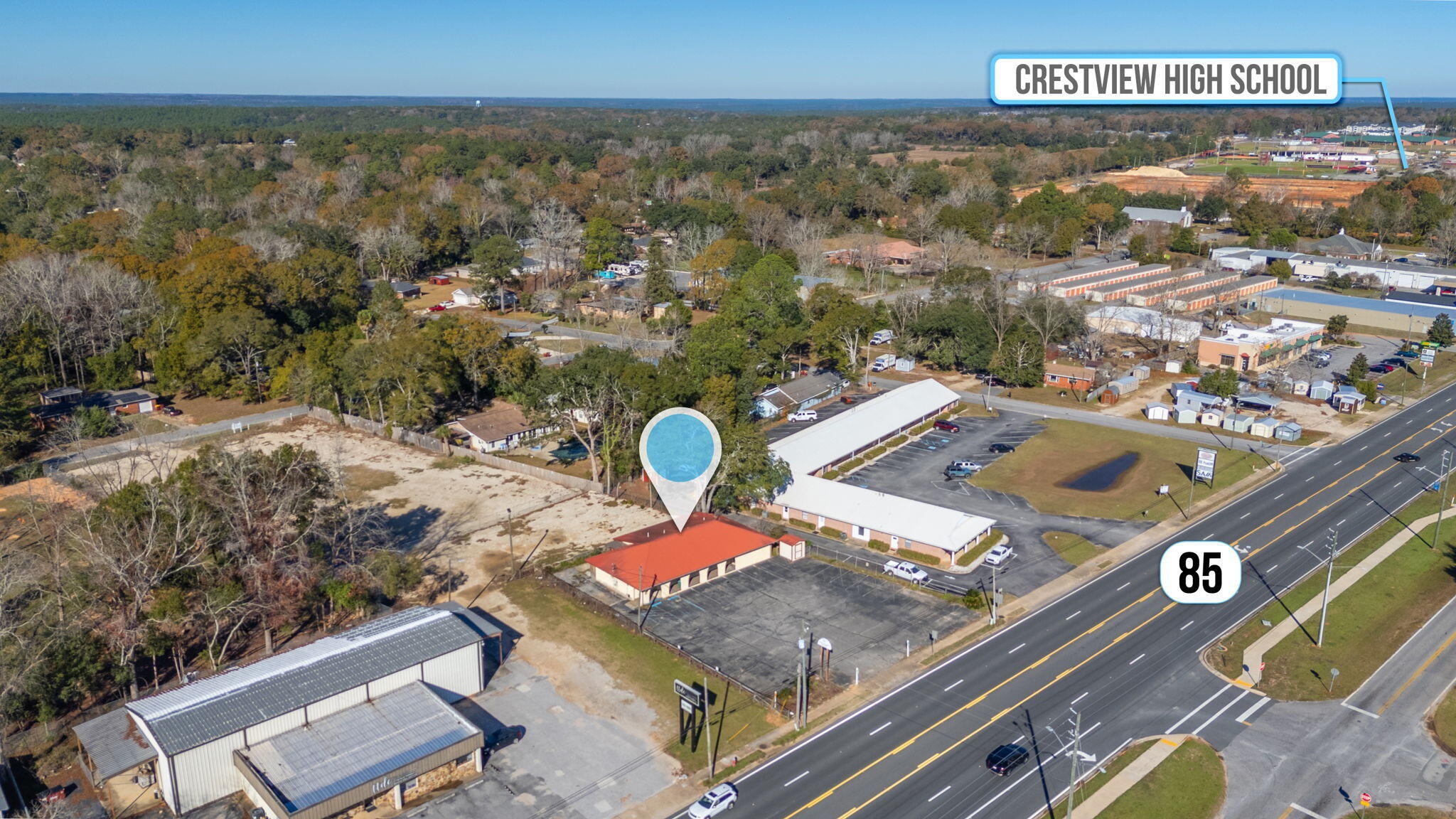 BACK ON MARKET, no fault of sellers! 
 This property is accross the street from the proposed site for Walmart.  Spacious commercial area with versatile usage options. Suitable for professional offices, retail, and more. Can be utilized as a single space or divided into three separate areas.