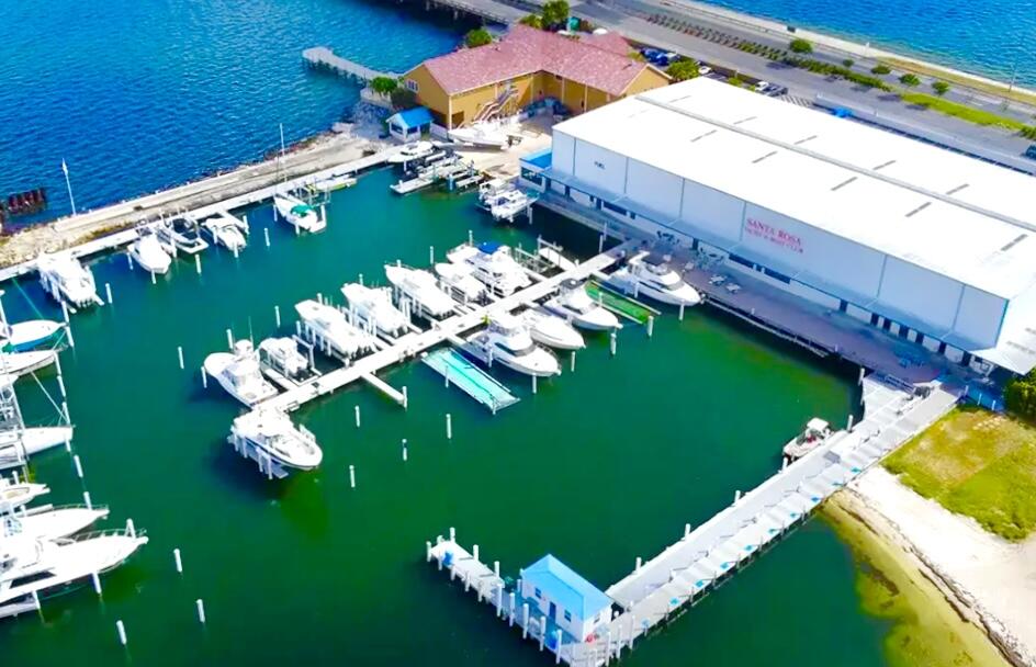 Dry Storage Boat Condo for Sale - Santa Rosa Yacht Club (SRYC), Gulf Breeze FL
'It's a Lifestyle!' Own a dry storage boat condo at the premier Santa Rosa Yacht Club in Gulf Breeze Florida.  Ideal for Sea-Doo's, Jet Ski's and small watercraft, with Secure storage and easy access to the water.
Slip Details * Slip #94 
Dimensions:  8'W X 5'6'H X29'L 
HOA: $297.00 per Month
Daily Launch Service:  *Winter 8:00am-5:00 pm, Main Season: 7:00am - 6:00pm. Marina Features:  Full-Service Marina, Fuel Dock, Pump Out Station.  Yacht Club Amenities: Club House, Exercise Room, Showers and clean Bath Facilities. Outdoor Deck, Meeting Room, Restrooms. This slip offers convenience, Security and access to one of the best boating locations in the area - Perfect for personal use or as an investment.