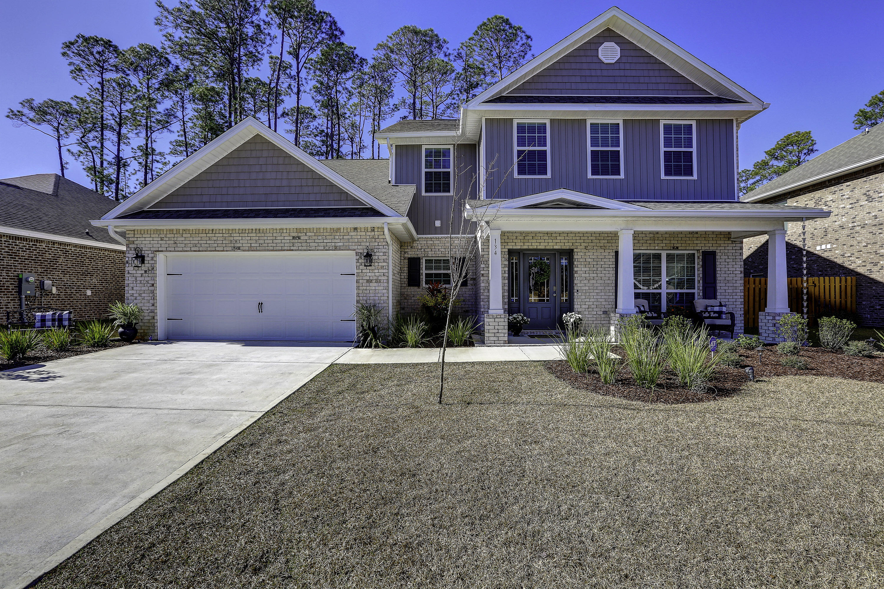This newly constructed Smarthome is immaculate and spacious. Less than a year old, it boast 3528 sq ft of open living space. It has been meticulously maintained and has over $70k in upgrades throughout. Located on an upgraded lot, enjoy the woodsy outdoors through the lanai while floating in the in-ground pool with waterfalls. In the evening the pool illuminates beautiful changing colors. Kitchen has stainless steel appliances, granite countertops, and all bedrooms have walk-in closets. Located minutes from the white sandy beaches, schools and shopping. This one won't last long, schedule your showing today.
