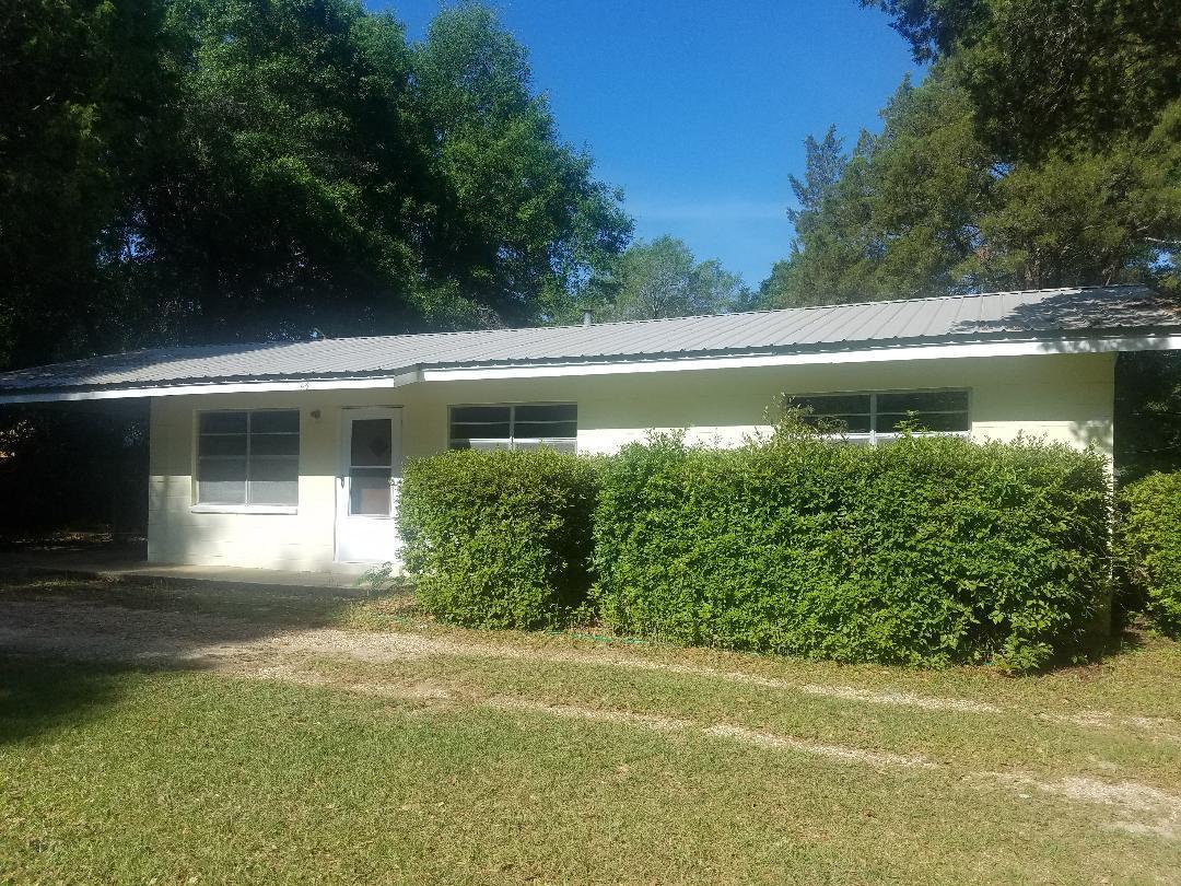 LISTED BELOW CURRENT APPRAISED VALUE! LOCATED IN THE HEART OF PAXTON JUST MINUTES FROM THE SCHOOL AND BEAUTIFUL LAKE JACKSON, THIS 3 BEDRROM 1 BATH HOME OFFERS A LIVING ROOM, DINING, AND KITCHEN WITH TONS OF CABINETS. HOME IS CONCRETE BLOCK WITH METAL ROOF GREAT FOR INSURANCE RATES. HOME HAS A BRAND NEW CENTRAL HEAT AND AIR UNIT, NEW FLOORING, AND NEW BATH VANITY. MOVE IN READY! HUGE LARGE LOT WITH PLENTY OF SPACE FOR ANY FAMILY!