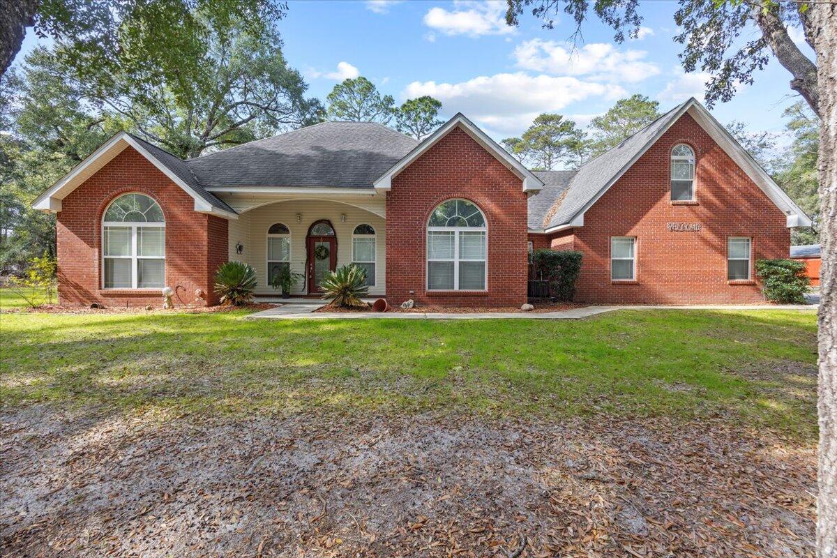 New roof at closing!!!!


Custom-built solid brick home on nearly 5 acres--designed for space, comfort, and future potential. 

Enjoy high ceilings, granite countertops, and an outdoor kitchen and hot tub! Also includes a large chicken hotel and a large room upstairs that would make a great bedroom, bonus room, or office! It has a large barn to store your toys, and a second driveway to hold an RV, boat, or additional parking. The property offers plenty of room for expansion, ideal for a multi-generational setup or family compound. 

A long boardwalk crosses the wetlands to additional high-and-dry land--perfect for a possible second homesite. Located directly across from the Freeport Horse Pavilion and just a short drive west to the Mid-Bay Bridge for easy access to Destin and the beaches
