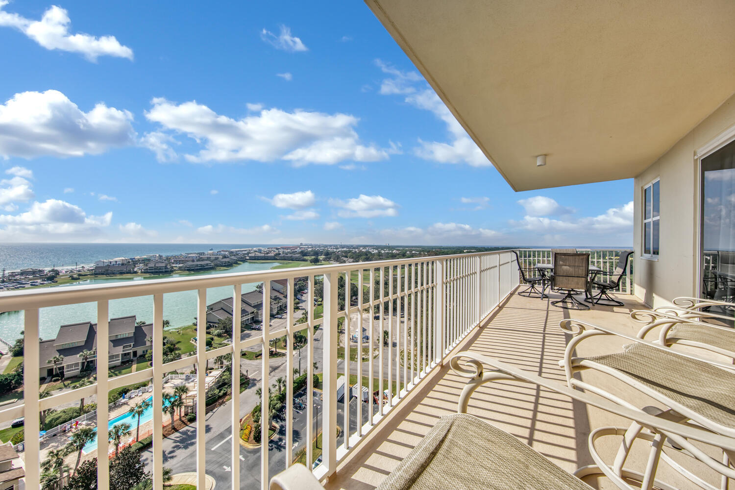 Gulf VEWS, Bay VIEWS, Lake VIEWS and Golf Course VIEWS.  This 3 BR, spacious, end unit is awe inspiring from virtually every room.  Southside patio is large enough for both a Dining and a Observation-seating area and a Northside patio that's the perfect tranquil hide-away.
With more than 1700 sq ft, this condo will feel more like a house.  Updated, coastal-elegant décor creates a clean, contemporary feel that will be appreciated by all.  Phenomenal amenities including stunning lobby area, 3 swimming pools, golf, tennis, fitness center, 4 elevators and an on-site restaurant w/ live entertainment.  Impressive Rental Projections!  HOA covers all utilities except electri