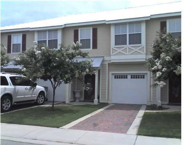 Great opportunity to own at Twin Lakes located in the heart of Destin and minutes away from the beautiful white sandy beaches. This old Florida Style town home has tile flooring, 9 ft ceilings and a large, covered patio facing the lake. The spacious 1st floor floorplan offers an open living room, dining room and kitchen with pantry, wood cabinets, granite bar, a convenient half bath and one car garage. Upstairs you will find the master bedroom with large walk-in closet and en-suite bathroom and two additional bedrooms. With a little TLC this can be a great home or investment property. Enjoy being close to the emerald coast beaches, shopping, restaurants, schools, and the famous Destin Harbor for fishing! Seller is giving a BUYERS' INCENTIVE $5000 towards buyers closing cost!