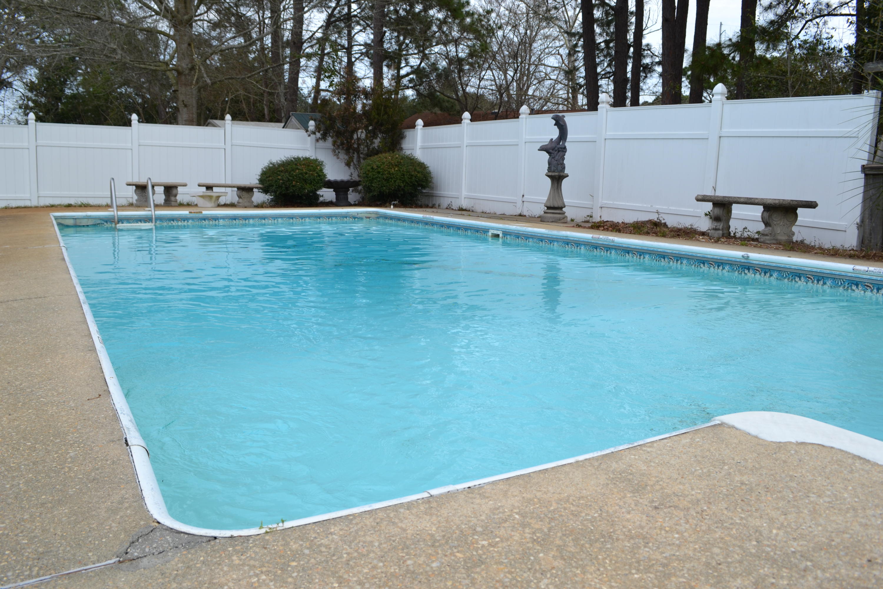 Don't miss out on this home! Centrally located in the heart of Fort Walton Beach, close to Eglin, Hurlburt, schools, shopping and more! This home has a large open floor plan with wood floors and beautiful brick wood burning fireplace! Living room has beautiful french doors which open to screened in porch, built in grill, and sparkling pool which is perfect for those warm Florida evenings. Washer and Dryer are included ''as is'' and will not be repaired or replaced by the owner. Owner will consider pets on a case by case basis with a Non-Refundable $250 Pet Deposit. Pool service is included. Security System wiring is in place and available to a new tenant at their own expense. No Smoking. Shed in the back yard is for Owner Use Only.