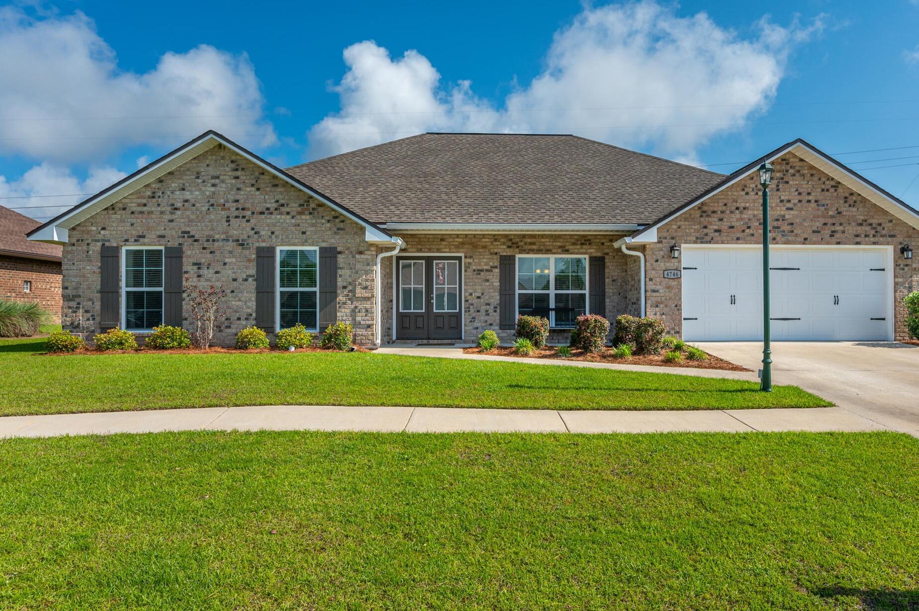 Beautiful, newer brick home located in the gated community of Chanan Estates, southeast of I-10 and within a very short commuting distance to Duke Field, Eglin AFB and Hurlburt Field.  This home features a very open SPLIT FLOOR PLAN with a second suite in separate area of the home; separate formal dining room; raised ceilings and a large, fenced backyard -- ample space for entertaining or play area for children, adults, or pets.  SHOWINGS START ON MAY 7 @ 12:00 noon (Open House)
