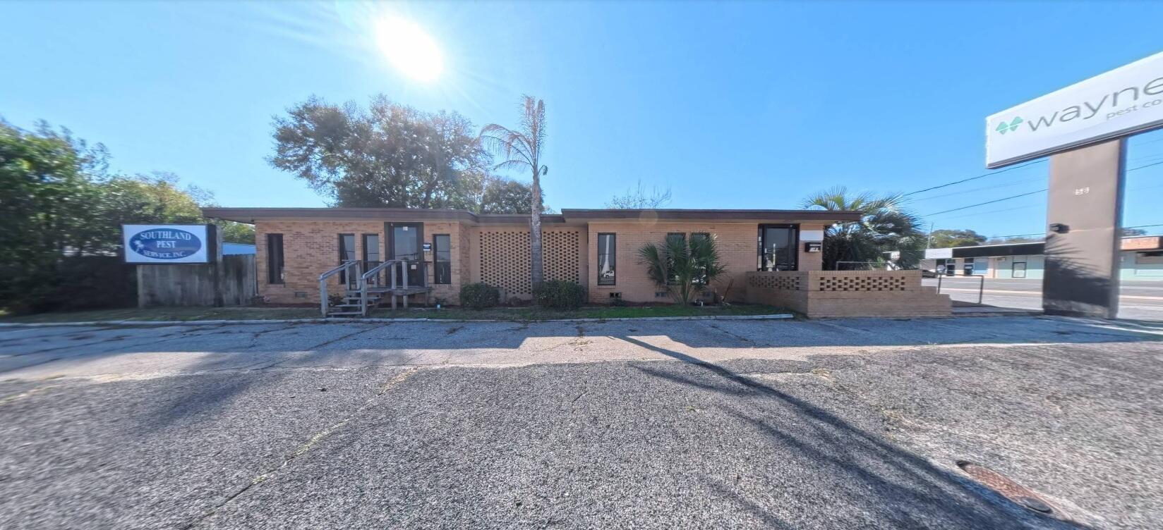 Prime Commercial Office Duplex with Outstanding Visibility on Beal Parkway! New Roof in 2021! Position your business for success in this highly visible 1,800 SF commercial property located along one of the area's busiest corridors. With exceptional traffic counts and prominent frontage, this property offers maximum exposure and easy accessibility--ideal for both established businesses and new ventures. Designed with flexibility in mind, the layout features two spacious reception areas, six private offices, a utility room, break room, and two restrooms, providing an efficient and professional workspace. Additional highlights include attached storage, a separate storage shed, and a large fenced yard--perfect for added functionality and security. Ample parking is available with direct access from Beal Parkway with a large parking area on the side fronting Holmes Boulevard for added convenience. This versatile duplex can be utilized as two separate units or easily converted into a single, larger space by opening the connecting door--making it suitable for a wide range of professional or retail uses. Don't miss this high-visibility opportunity--schedule your showing today!